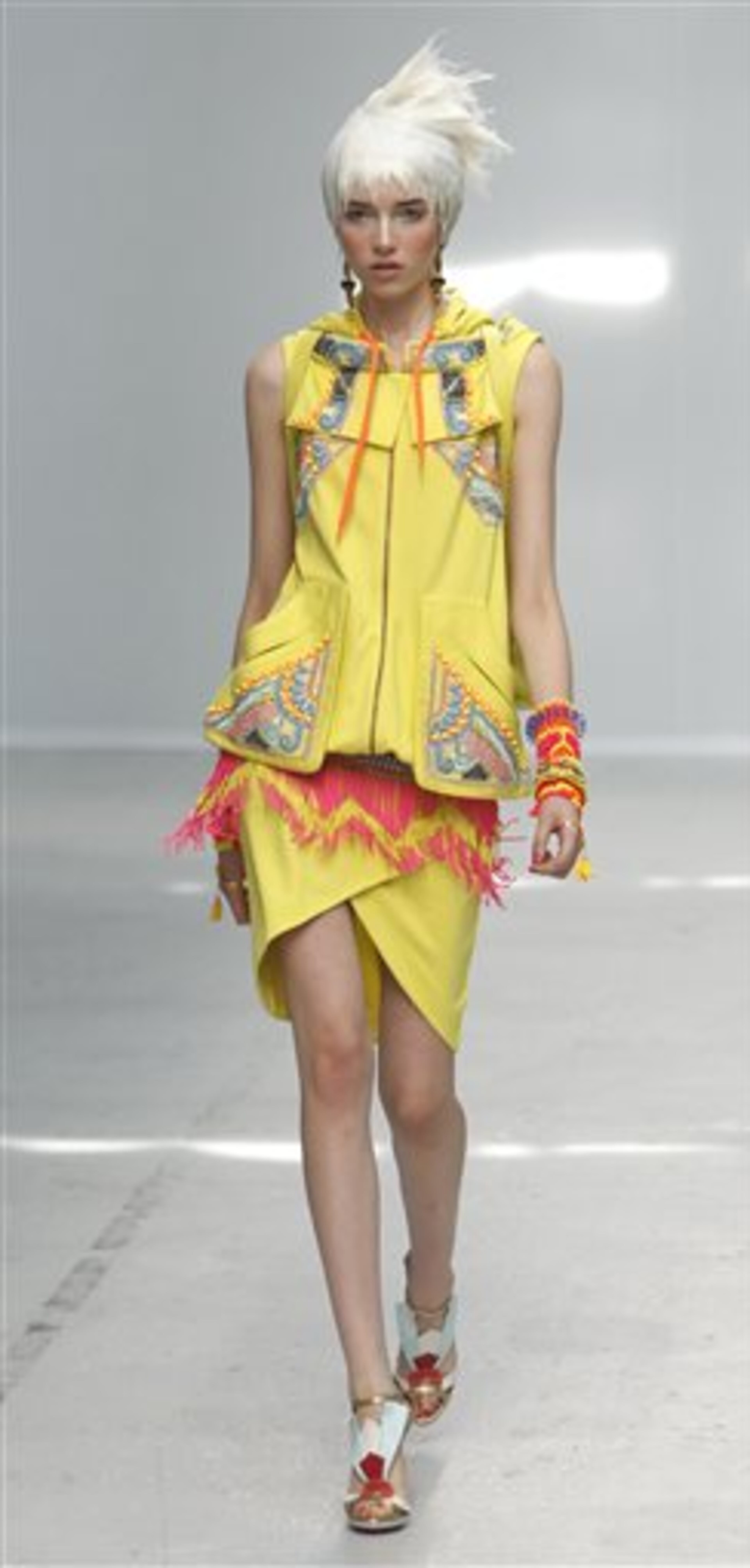 A model wears a creation as part of Indian fashion designer Manish Arora's ready-to-wear Spring-Summer 2014 fashion collection presented in Paris, Thursday, Sept.26, 2013. (AP Photo/Thibault Camus)