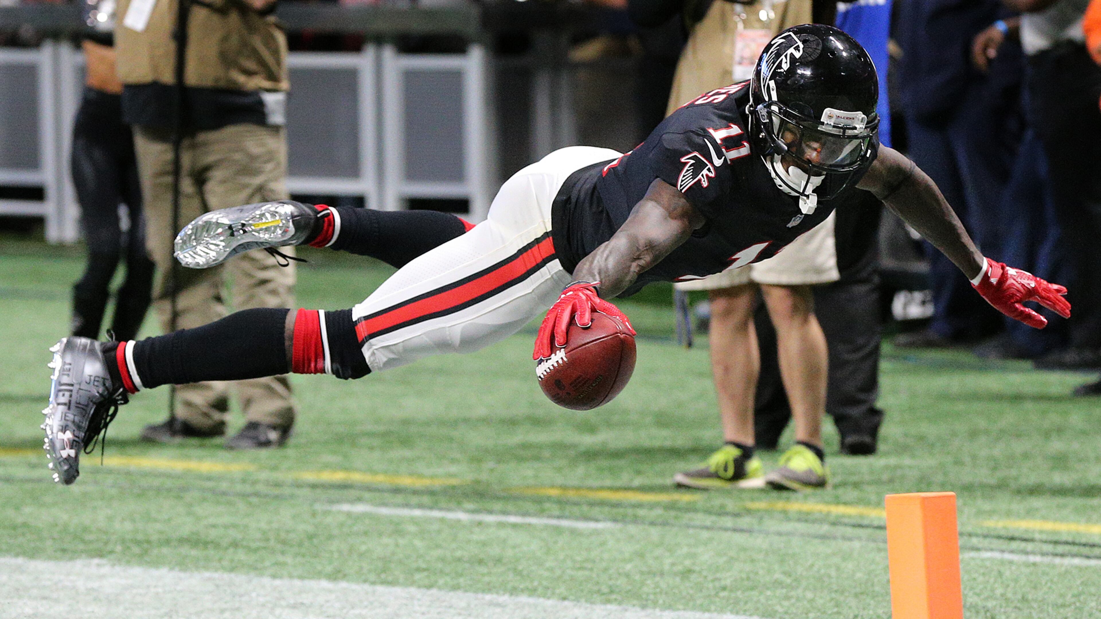 Falcons wide receiver Julio Jones soars into the endzone to score his second touchdown on the day during the second quarter against the Buccaneers in a NFL football game last November in Atlanta. (Curtis Compton/ccompton@ajc.com).
