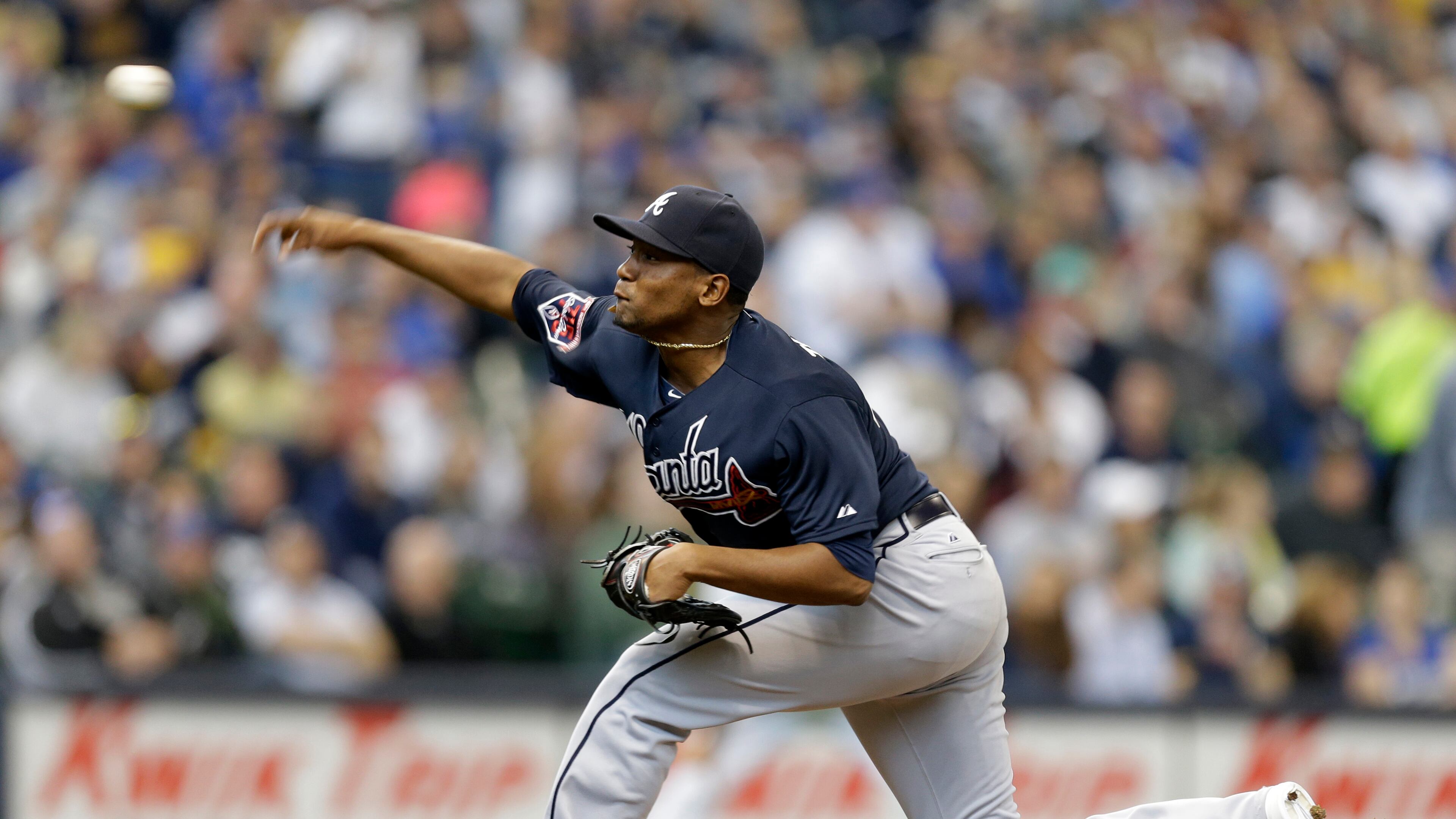 Atlanta Braves starting pitcher Julio Teheran throws to the Milwaukee Brewers in the first inning of an opening day baseball game Monday, March 31, 2014, in Milwaukee. (AP Photo/Jeffrey Phelps) The Braves' Julio Teheran was not dominant but he allowed only two runs in six innings. (AP photo)