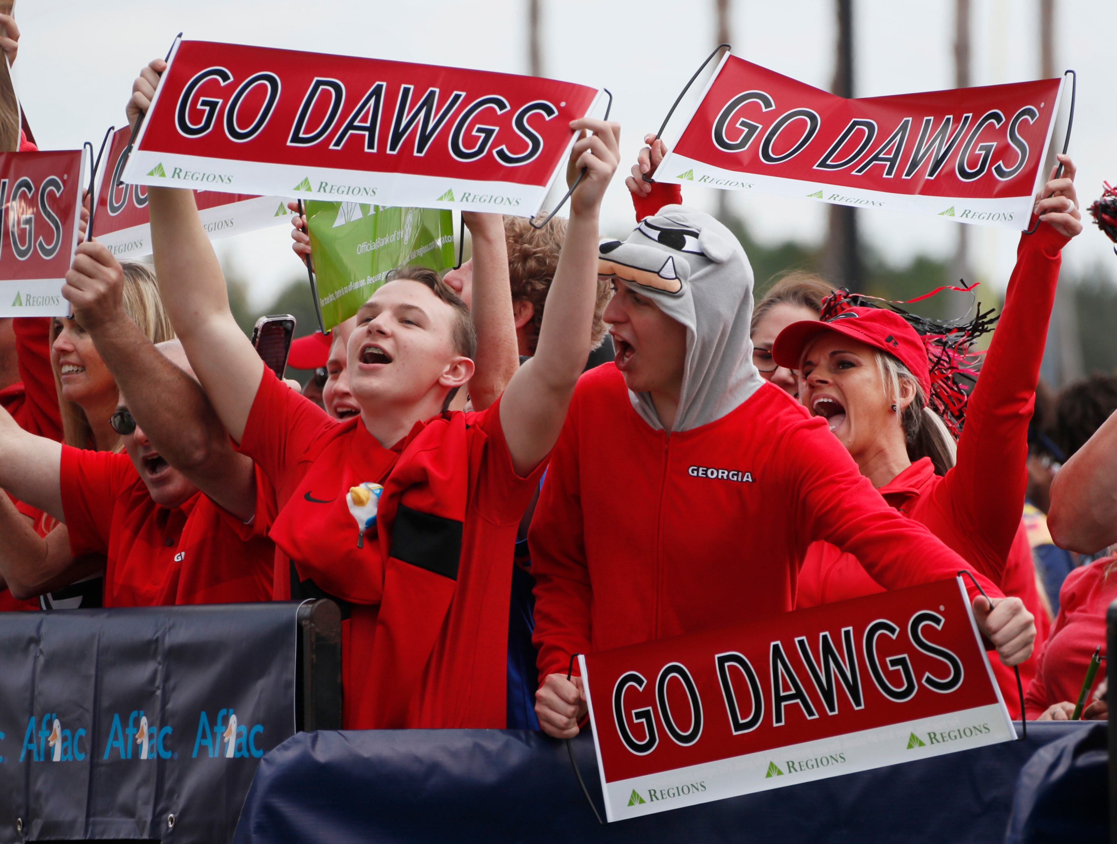 Georgia fans cheer during the broadcast of SEC Nation outside of the stadium.Bob Andres / robert.andres@ajc.com