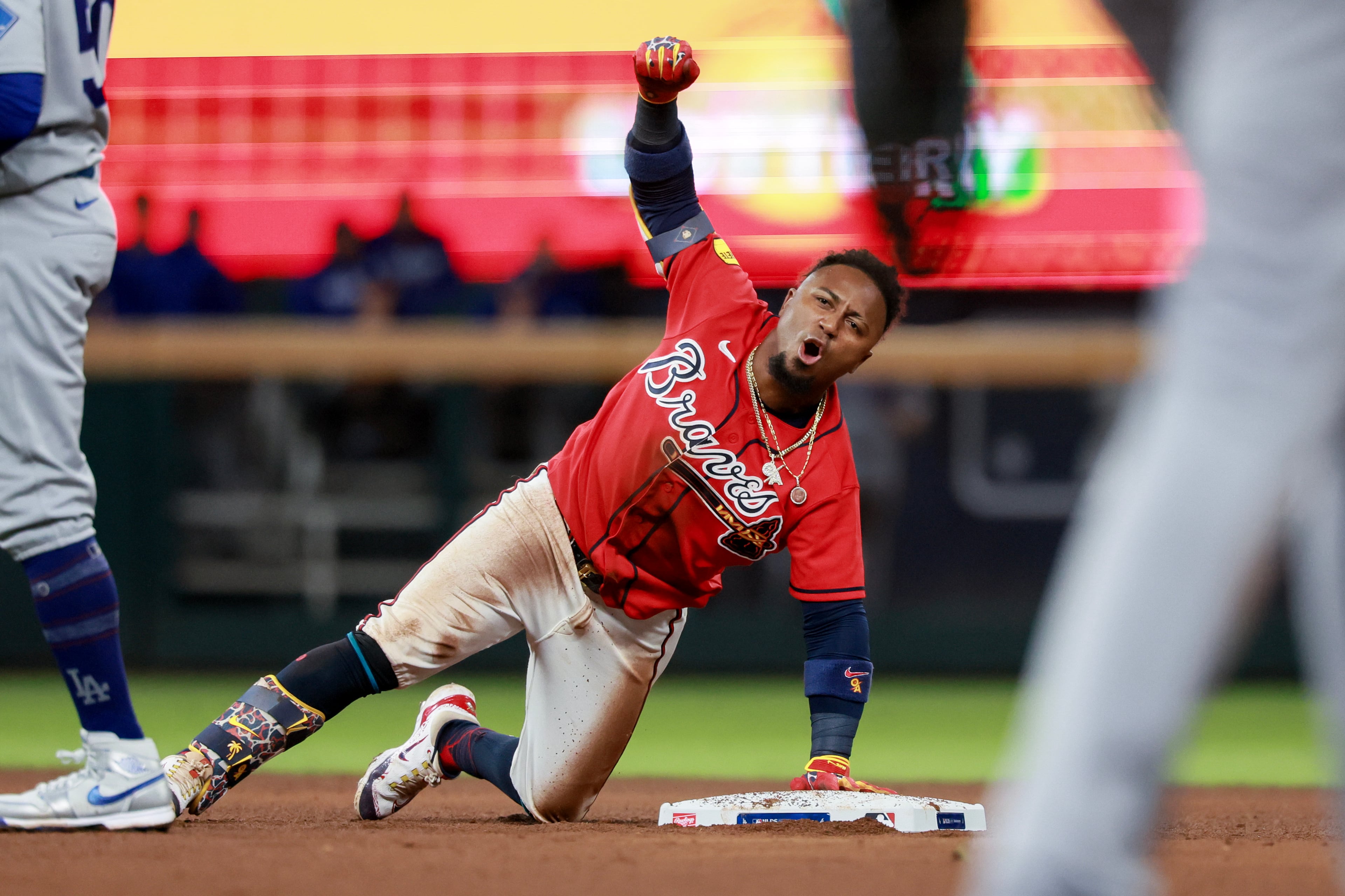 Atlanta Braves' Ozzie Albies reacts after hitting a leadoff double against the Los Angeles Dodgers during the ninth inning of Game 3 of the MLB National League Division Series between the Atlanta Braves and the Los Angeles Dodgers, Tuesday, Oct. 6, 2026, in Atlanta. (Jason Getz/AJC)