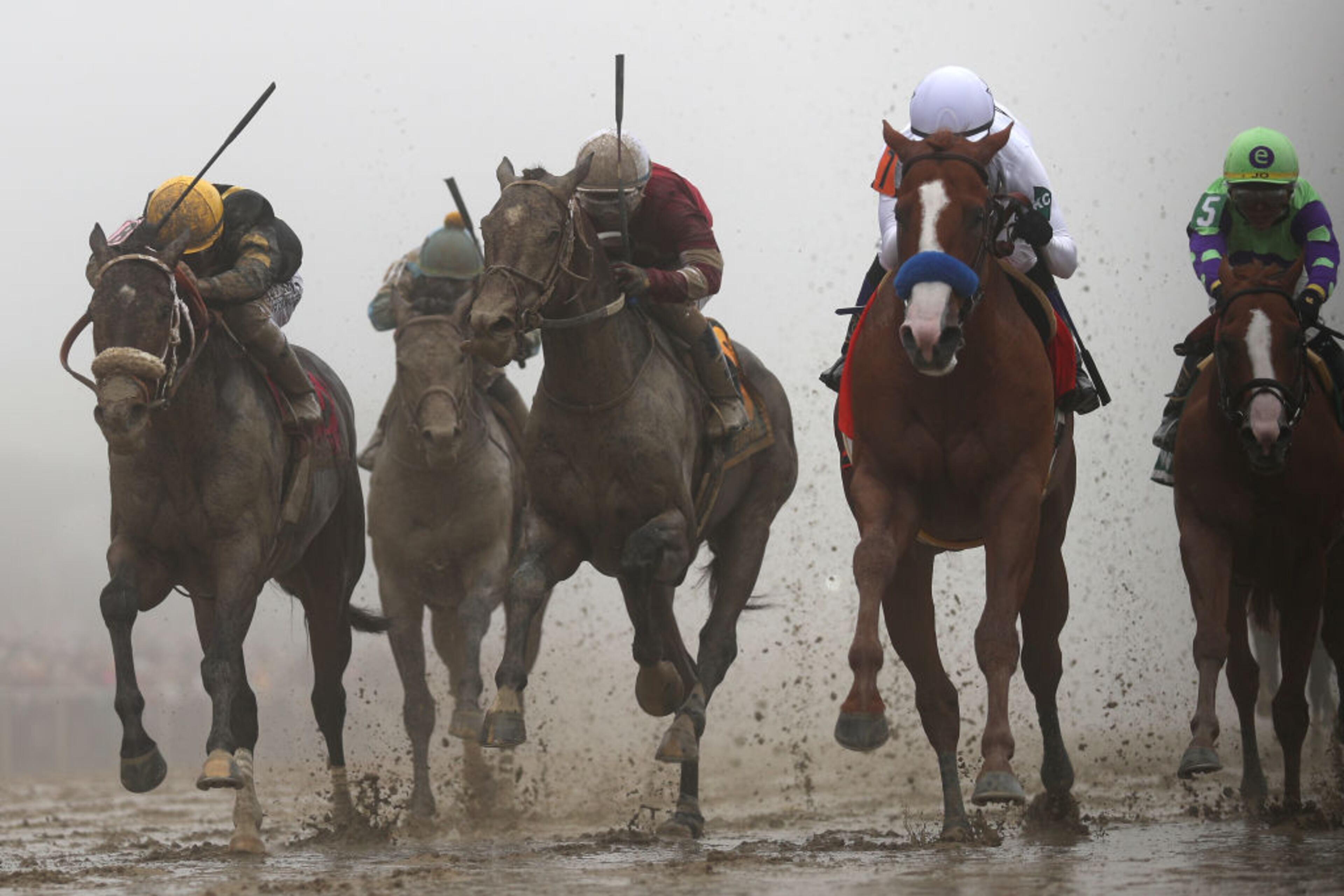 BALTIMORE, MD - MAY 19: Justify #7 ridden by jockey Mike Smith wins the 143rd running of the Preakness Stakes at Pimlico Race Course on May 19, 2018 in Baltimore, Maryland. (Photo by Patrick Smith/Getty Images)