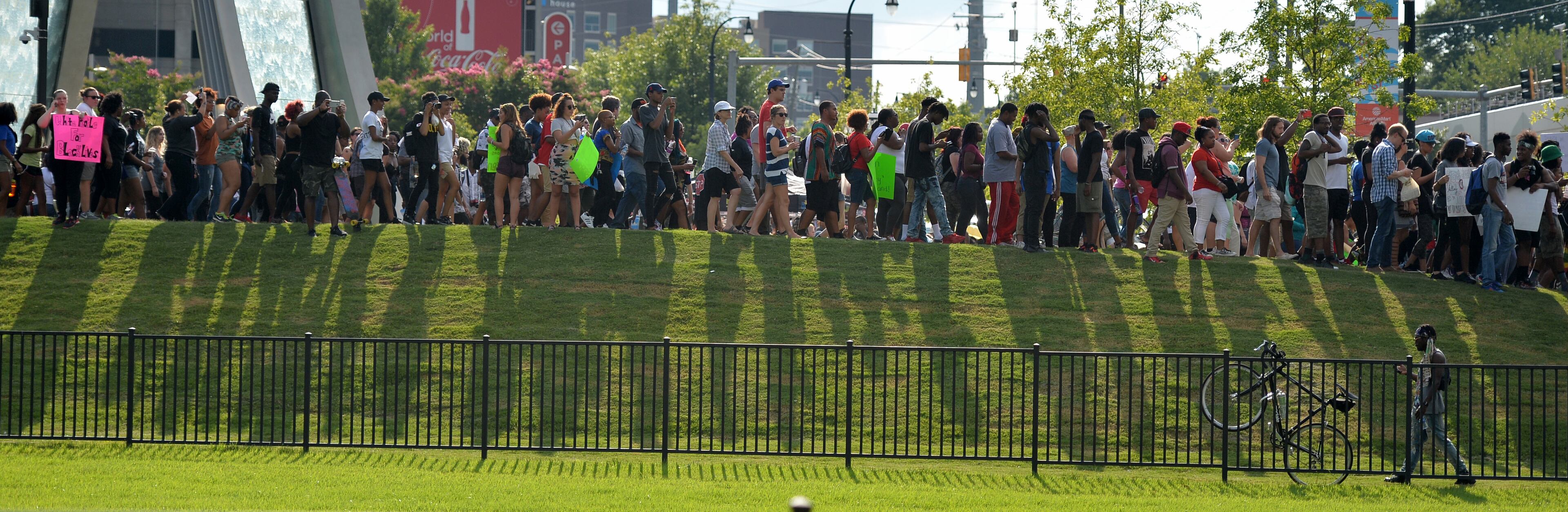 Thousands gathered in the streets of Atlanta Friday July 8, 2016, to protest the recent police shootings that have happened around the country. The group gathered outside the National Center for Civil and Human Rights before marching to Centennial Olympic Park and surrounding streets.