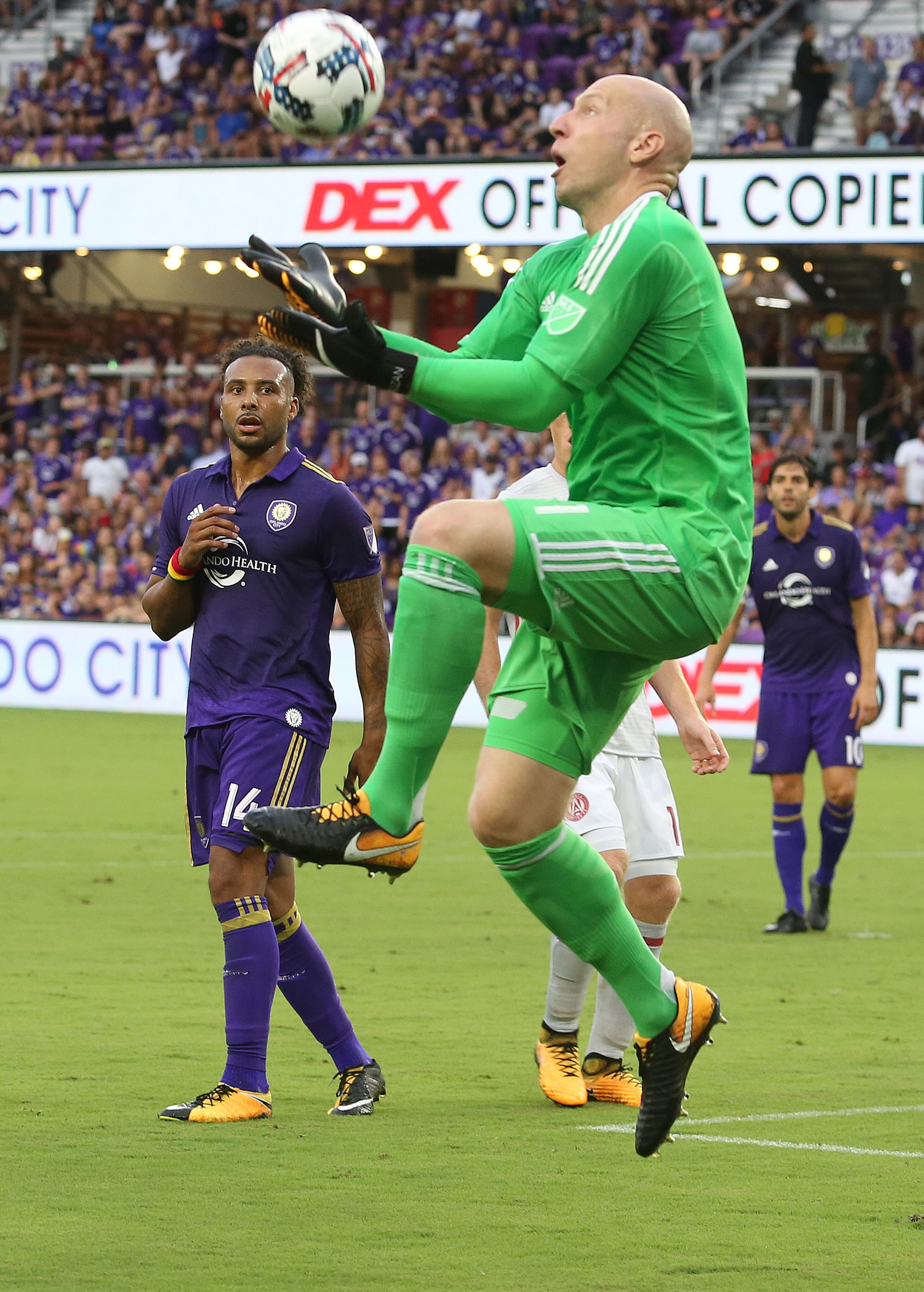 Atlanta United goalkeeper Brad Guzan leaps to make a save during a 1-0 win against Orlando City at Orlando City Stadium on Friday, July 21, 2017, in Orlando, Fla. (Stephen M. Dowell/Orlando Sentinel/TNS)