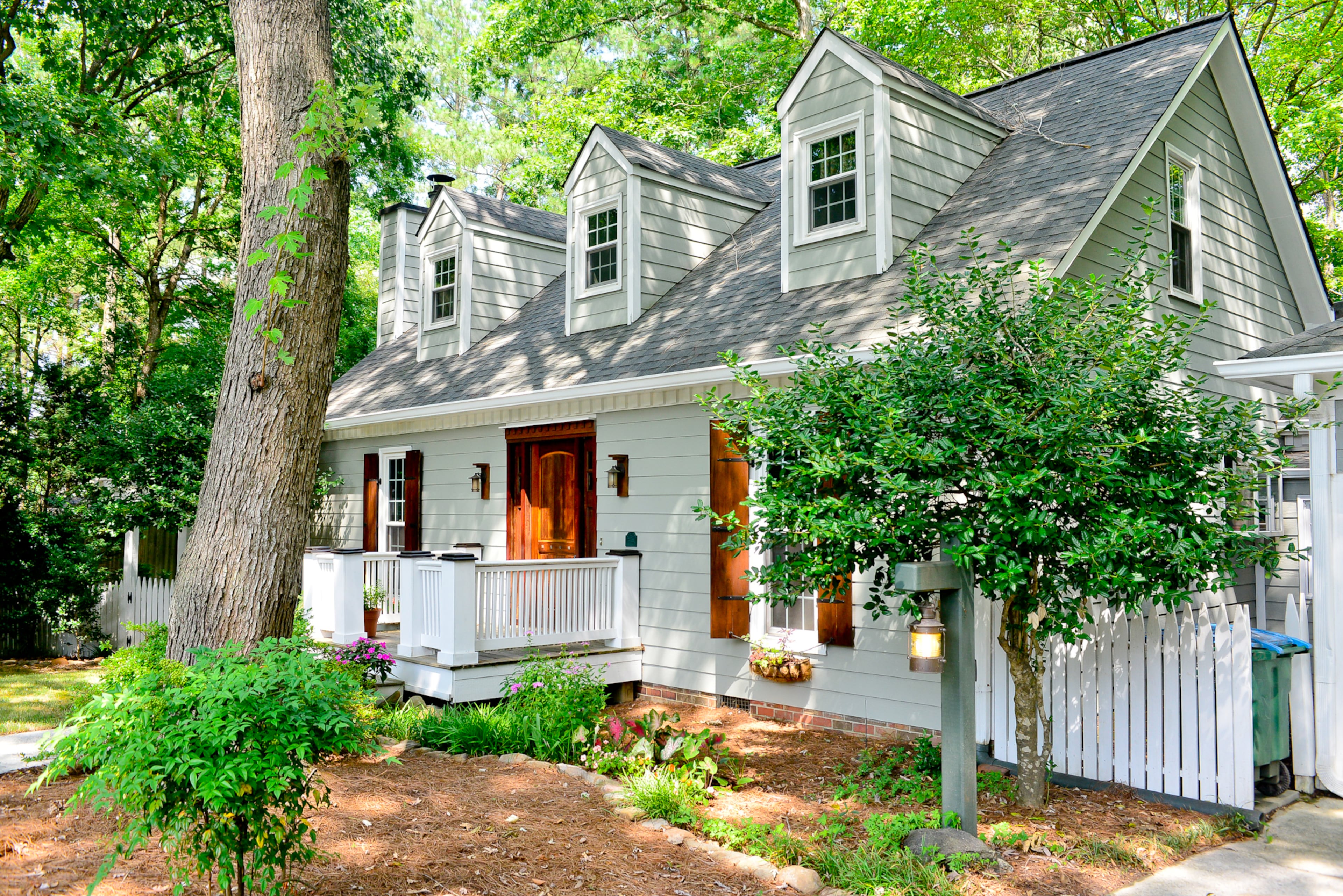 The Cape Cod-style home has grown over the years from its original 1,900 square feet to its current 3,000 square feet. The Peachtree Corners house sits on about an acre at the end of a cul de sac, giving the homeowners plenty of room for their gardens.