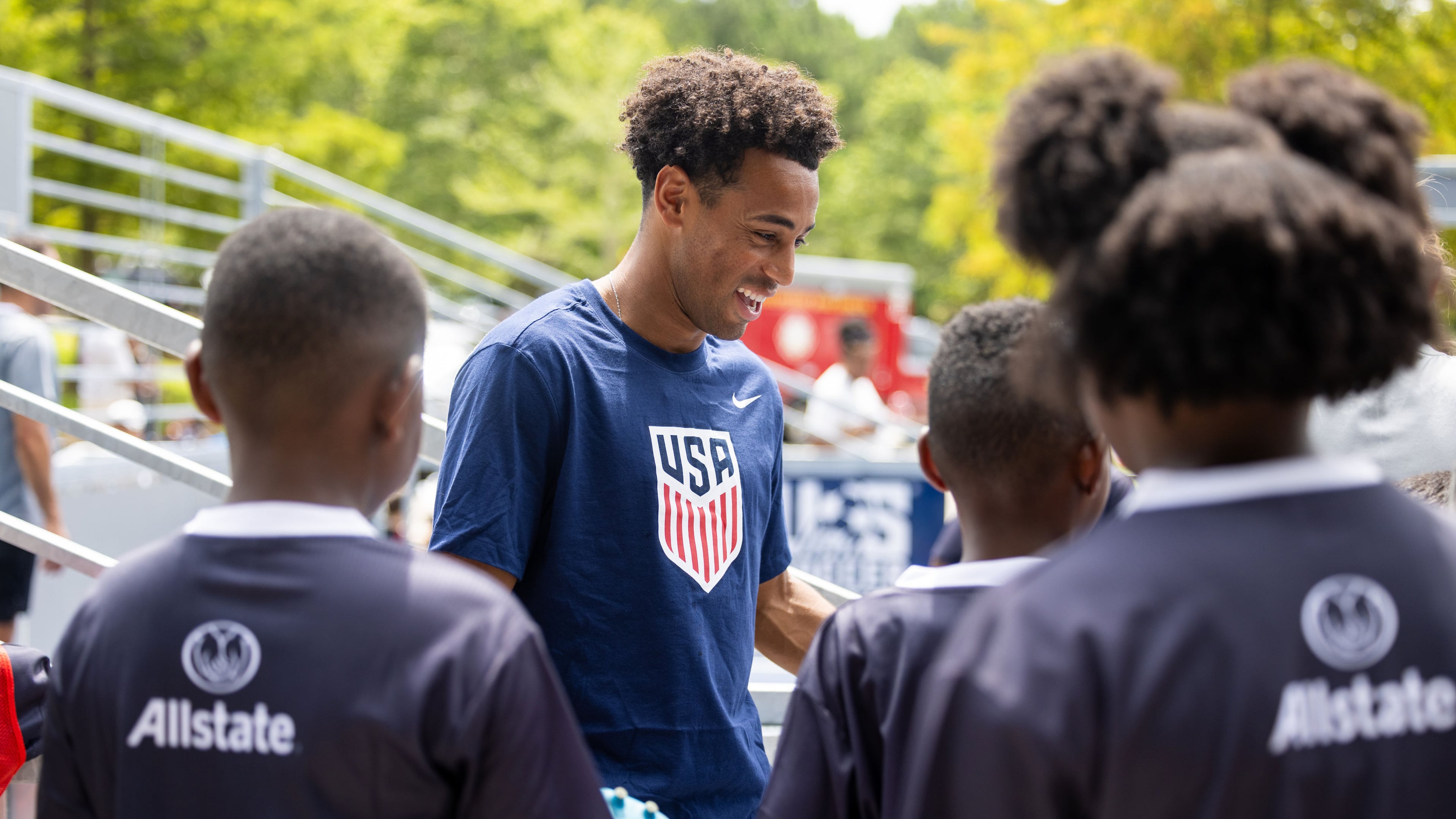 U.S. men's national team player Tyler Adams (center) participates in the unveiling of a minipitch at Sandtown Park in South Fulton on Tuesday, July 21, 2026. (Courtesy of Jenn Finch/Rank Studios)