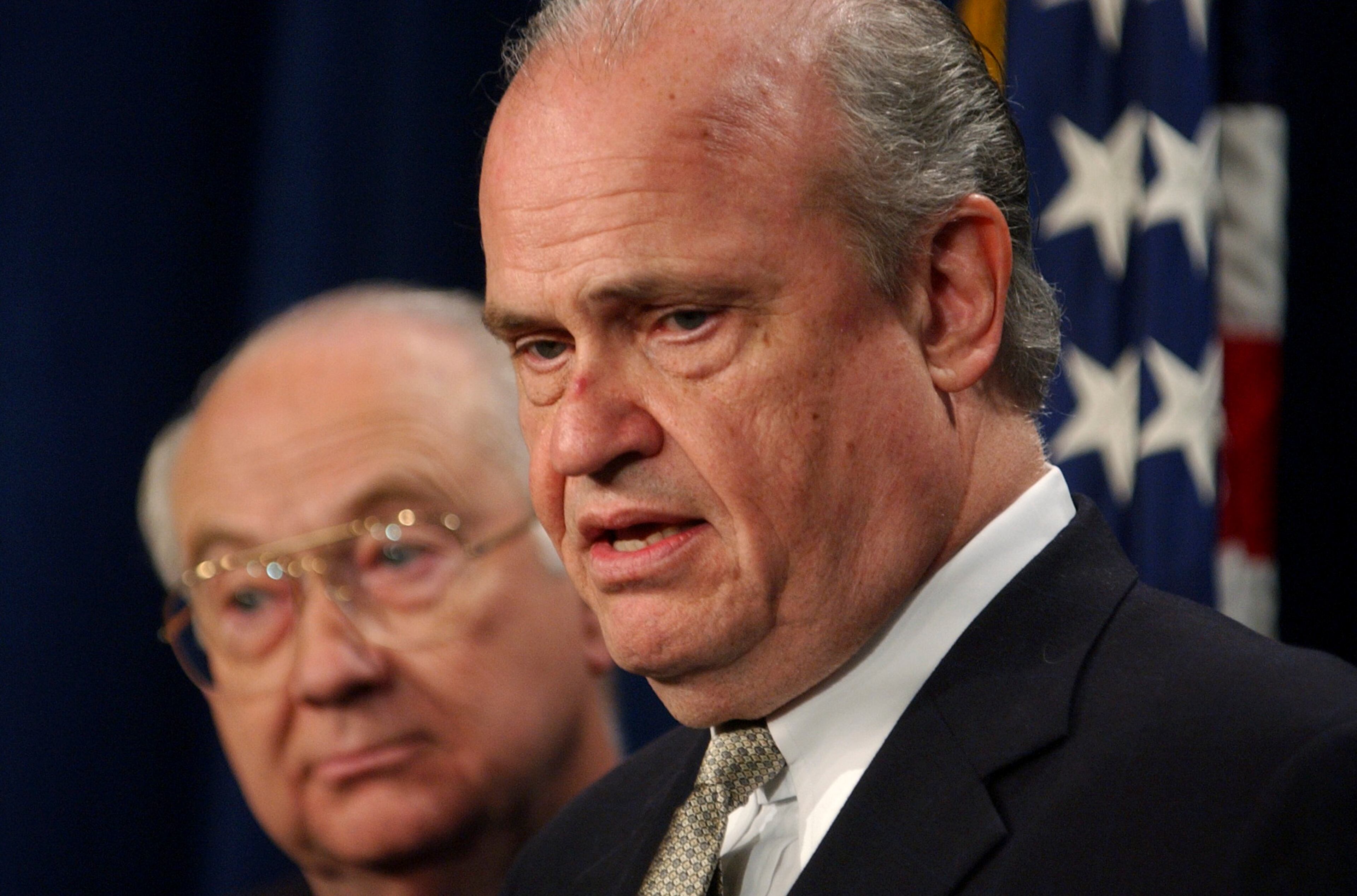 UNITED STATES - NOVEMBER 19: Sens. Phil Gramm, R-Texas, left, and Sen. Fred Thompson, R-Tenn., speak at a news coference, following a bid by Democrats to amend homeland security legislation. (Photo By Tom Williams/Roll Call/Getty Images)