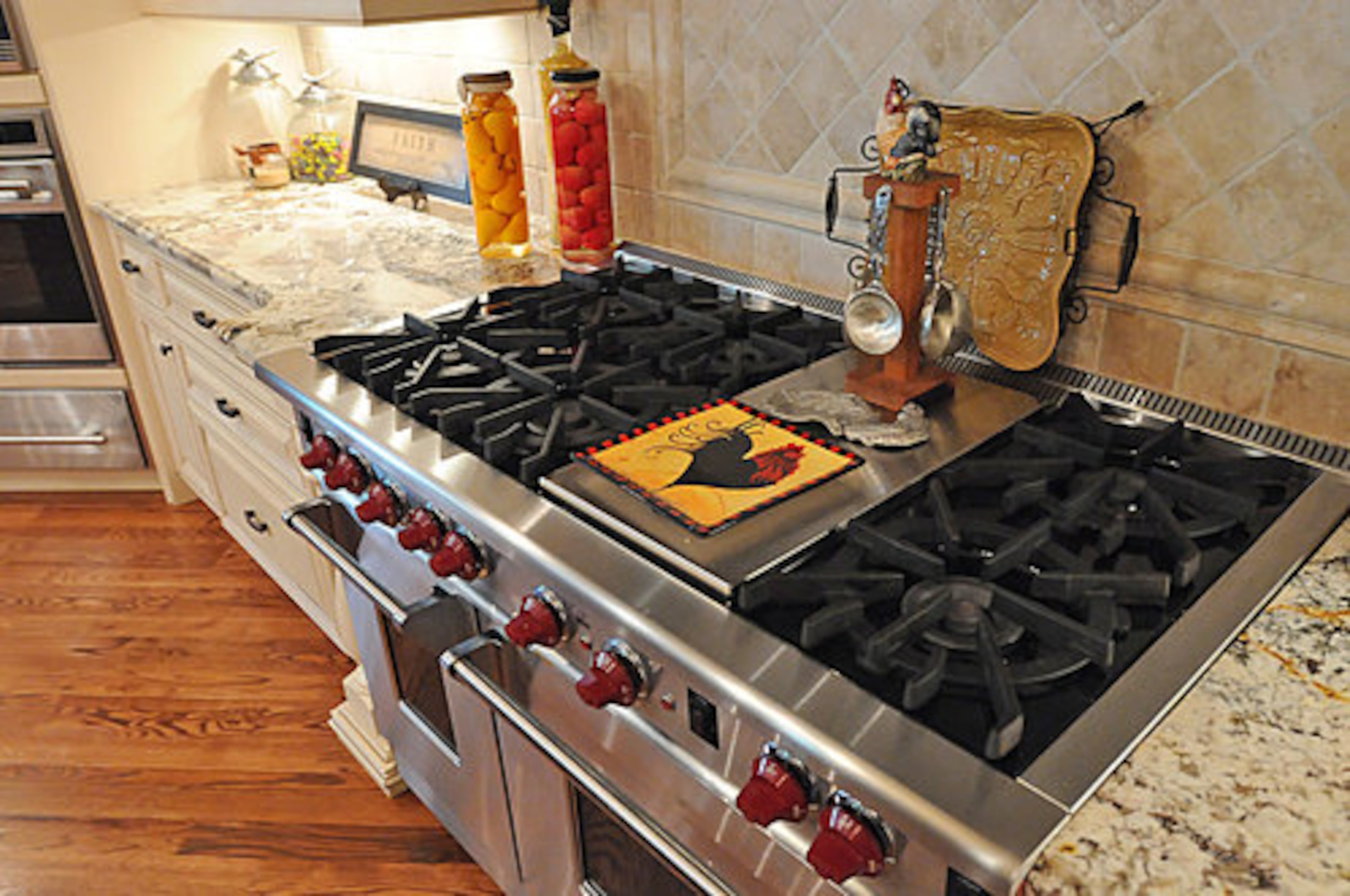 All kitchen appliances are high-quality Wolf and Sub-Zero brands. This double range is ideal for those who love to cook and entertain.