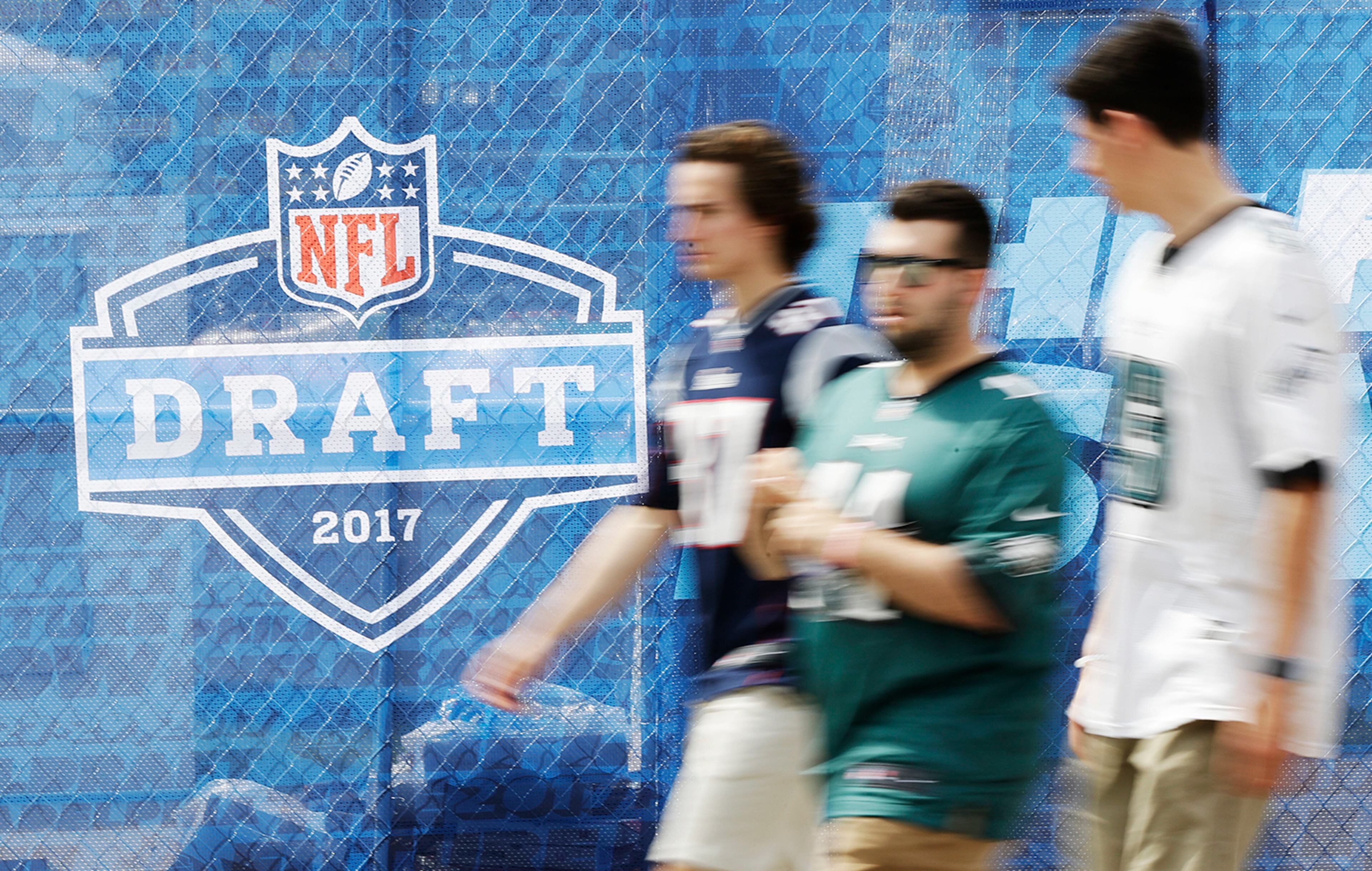 Fans arrive ahead of the 2017 NFL football draft in Philadelphia, Thursday, April 27, 2017. (AP Photo/Matt Rourke)