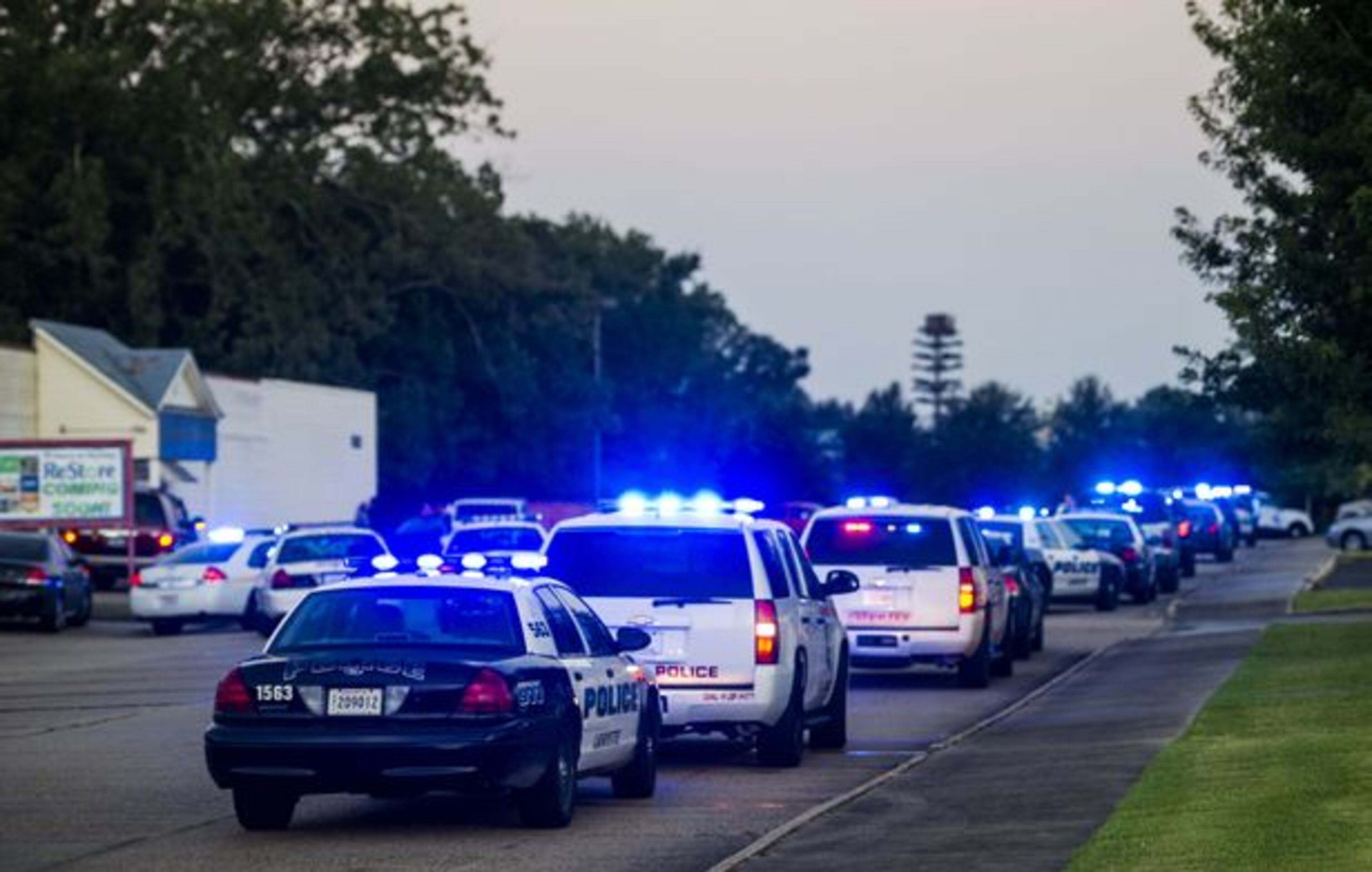Police surround the scene following a shooting at a movie theater Thursday, July 23, 2015, in Lafayette, La. (AP)