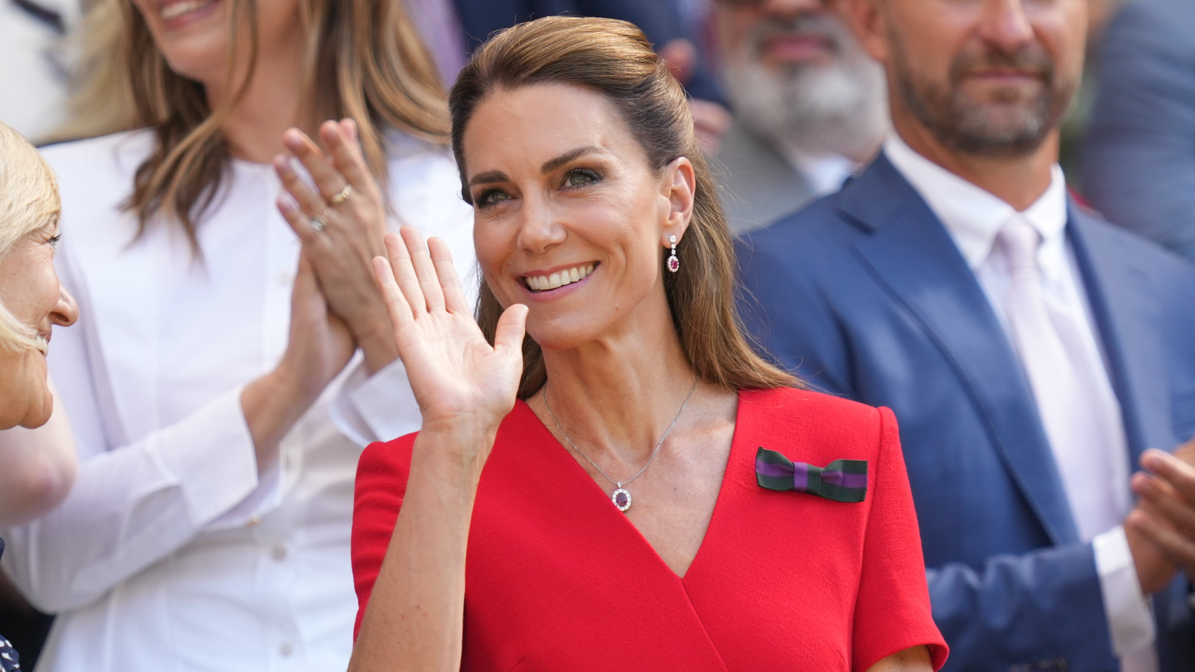 Britain's Princess Kate waves from the royal box on day 13 of the Wimbledon Tennis Championships in London, Saturday, July 11, 2026. (AP Photo/Kirsty Wigglesworth)