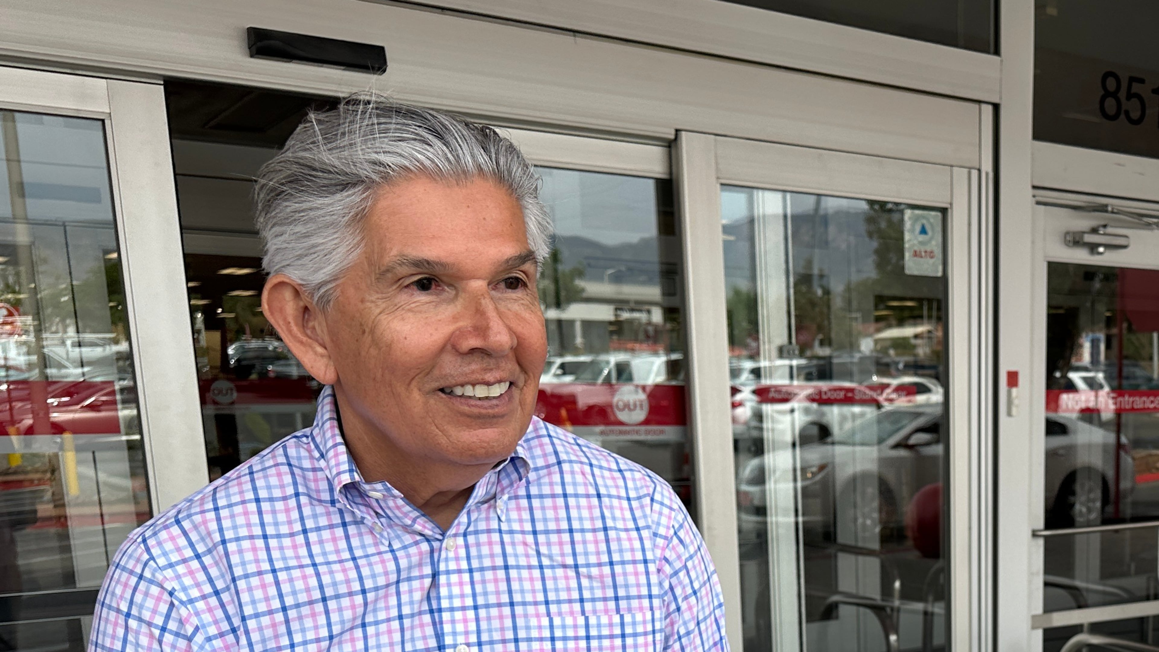 FILE - Republican gubernatorial candidate Duke Rodriguez talks with a voter in Albuquerque, N.M., Tuesday, June 2, 2026. (AP Photo/Susan Montoya Bryan, File)