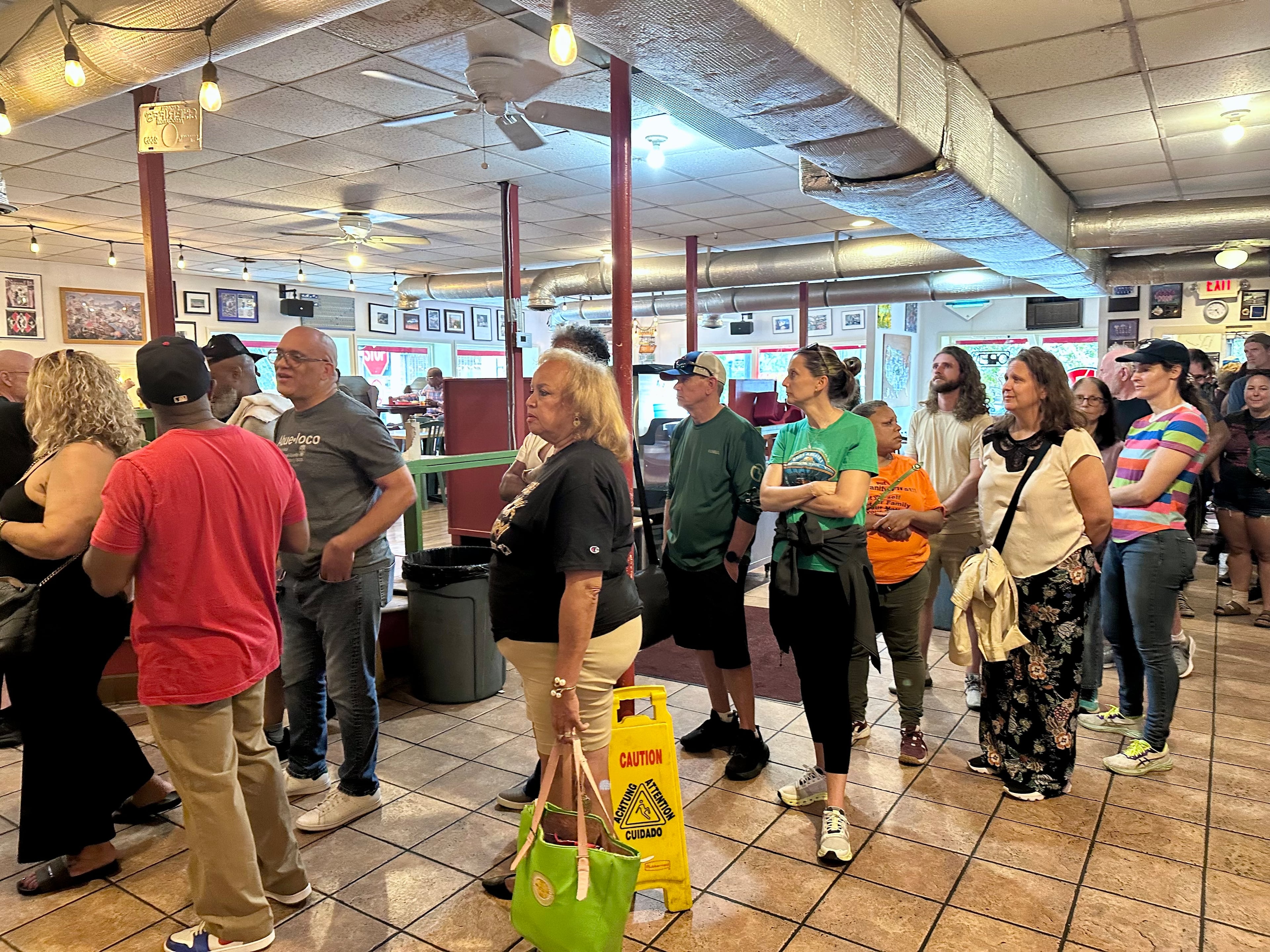 People wait for a final meal at Eats on Saturday, Oct. 18, 2025. (Amy Wenk/AJC)