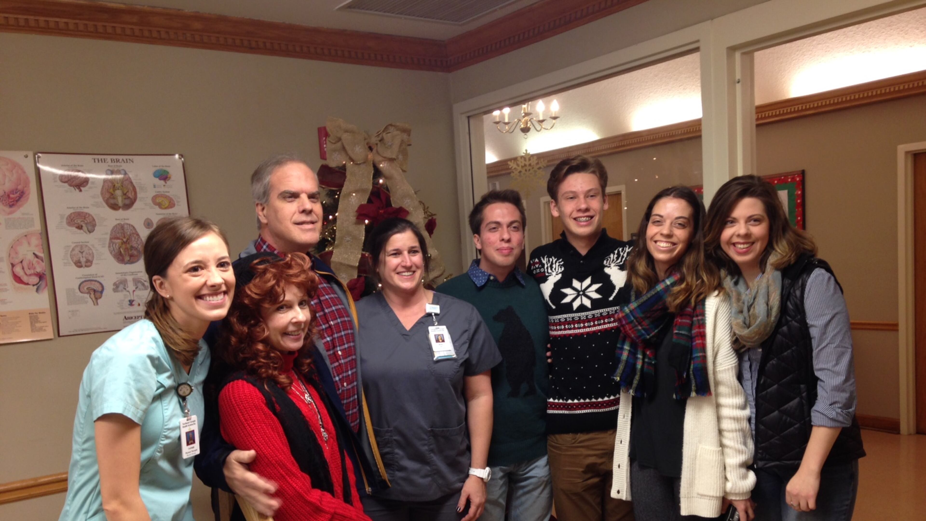 After a viral attack, former Georgia Tech football player Mike Darby was expected to die in June but is now healthy. He visited the Gainesville rehabilitation facility last Thursday to visit residents and thank therapists. In the photo, left to right: Physical therapist Carleigh Turner, wife Deana, Darby, occupational therapist Becky Lesco, sons Brendon and Nicholas and daughters Natalie and Stefanie.