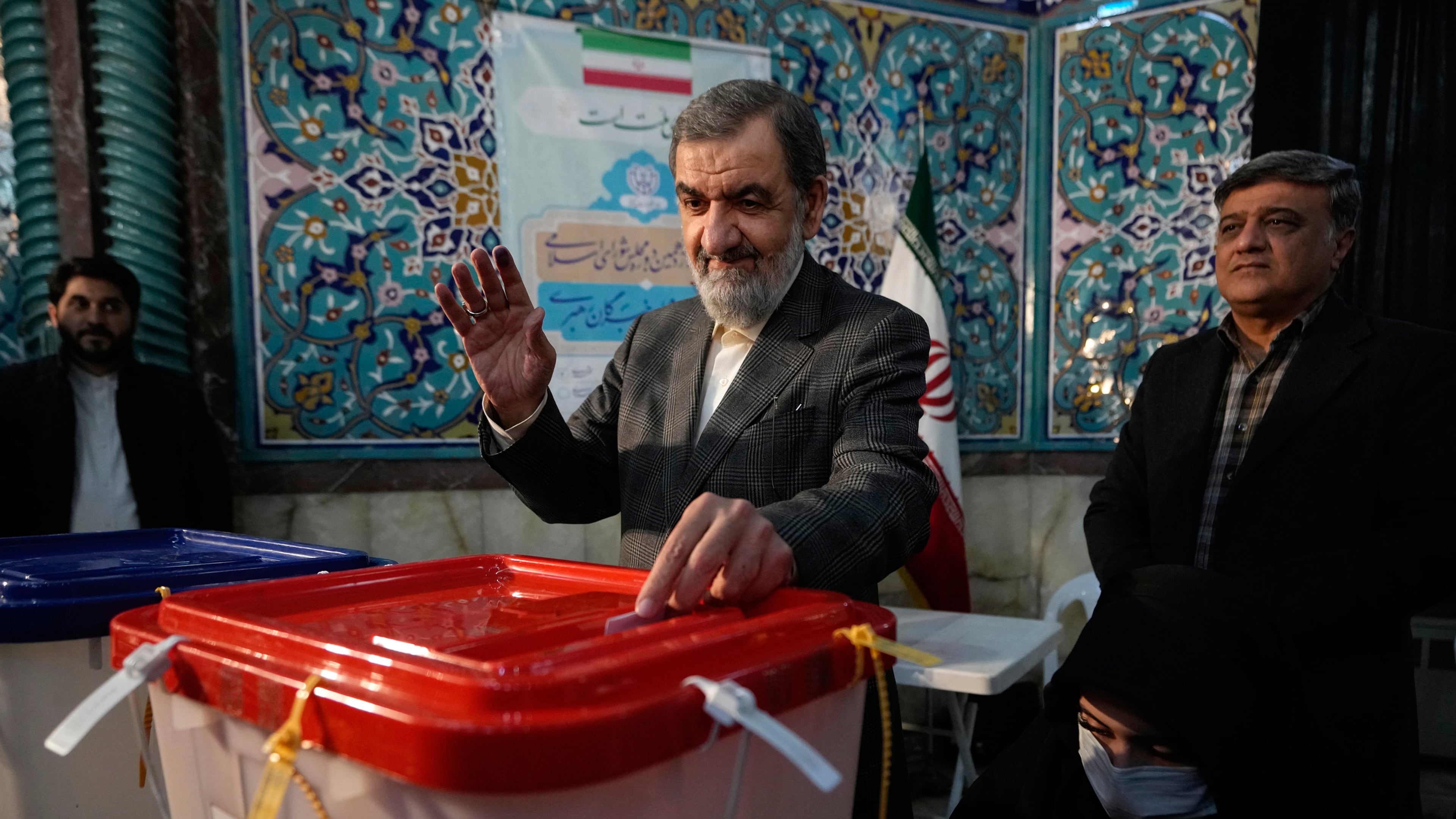 FILE - Former Revolutionary Guard commander Mohsen Rezaei casts his ballot during the parliamentary and Assembly of Experts elections at a polling station in Tehran, Iran, March 1, 2024. (AP Photo/Vahid Salemi, File)