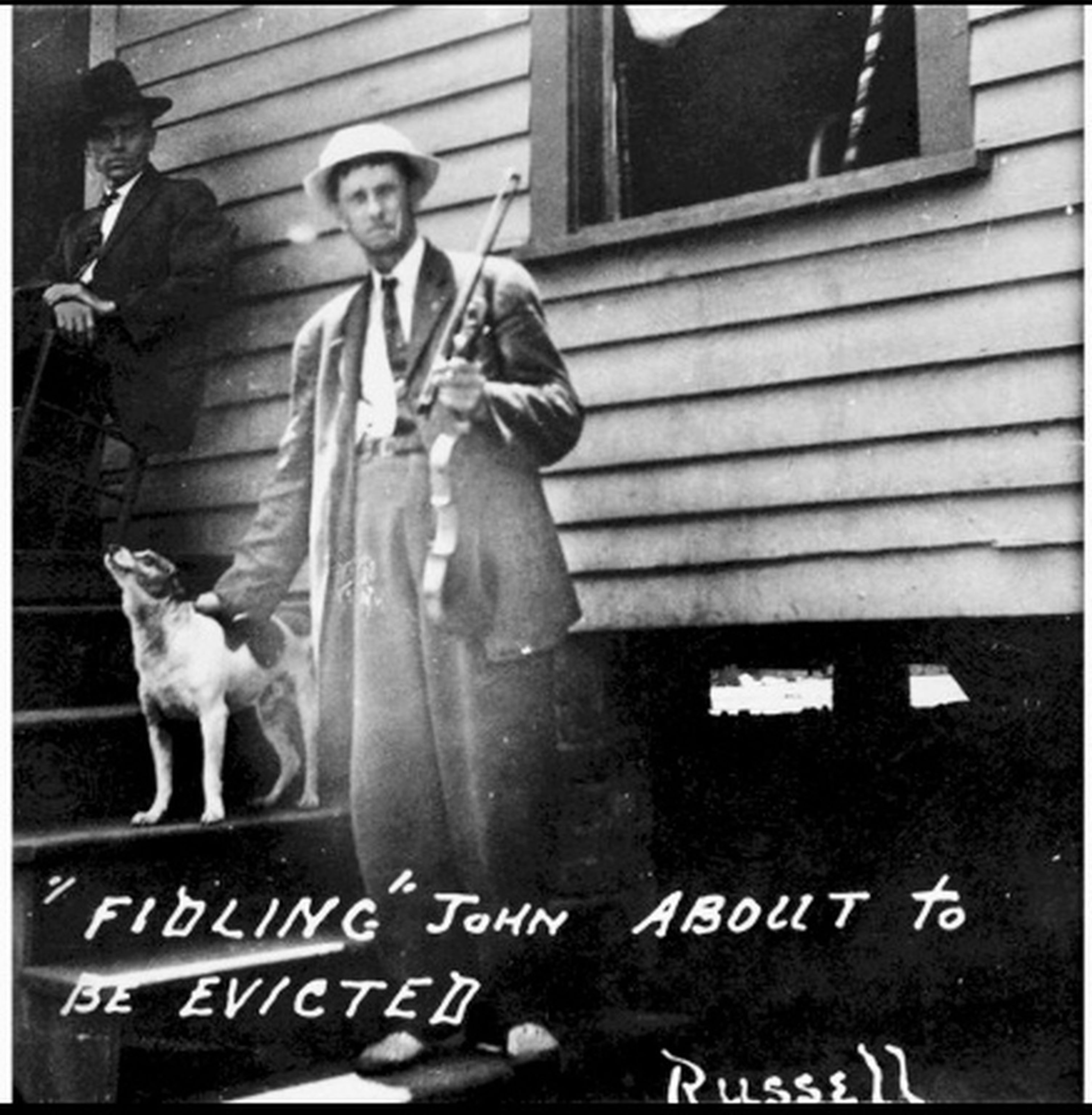 “Hillbilly” music star Fiddlin’ John Carson having a bad afternoon.