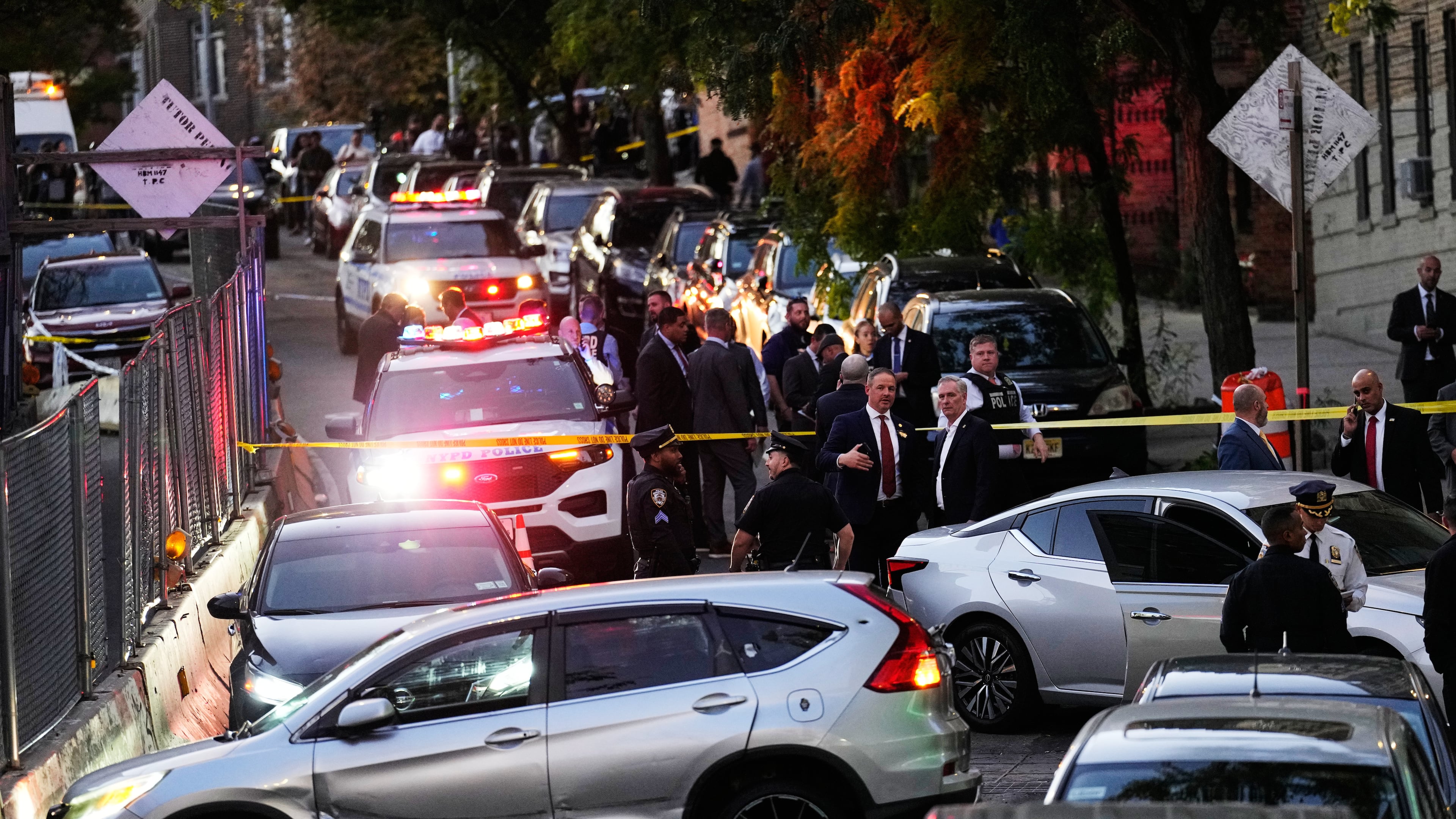 Law enforcement work the scene of a shooting Thursday, Oct. 8, 2026, in New York. (AP Photo/Seth Wenig)