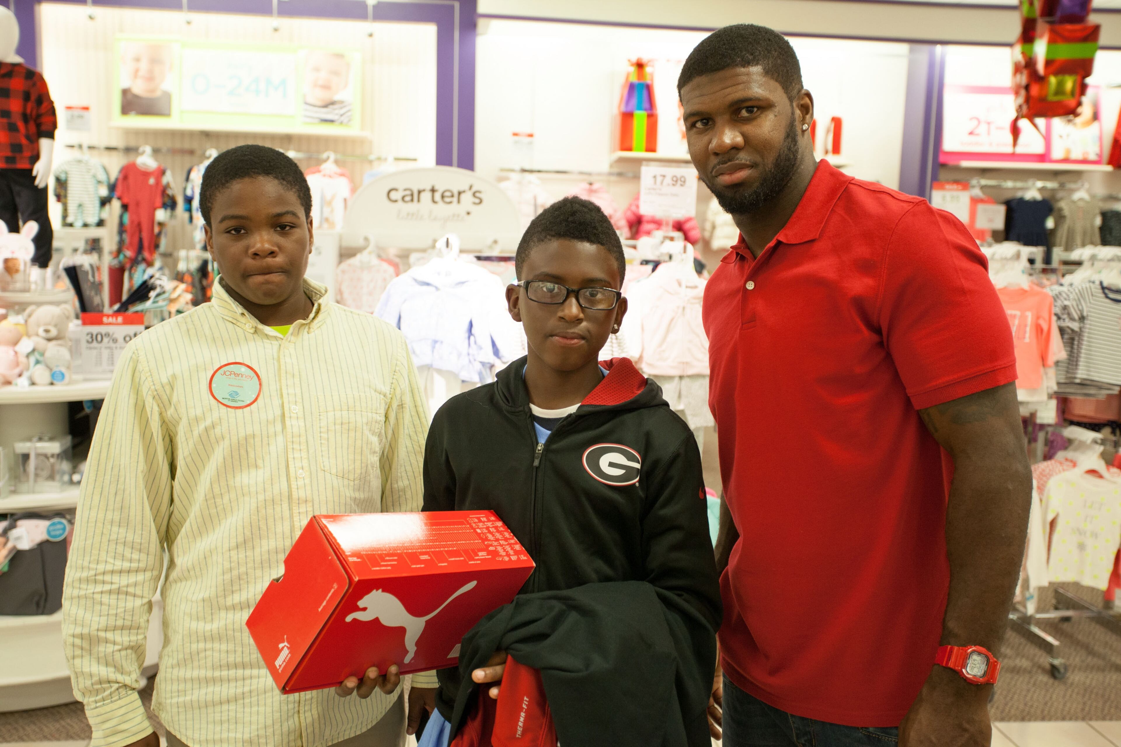 Atlanta Falcon Devin Hester surprises the Boys & Girls Club of Metro Atlanta with a holiday shopping spree for #GivingTuesday at JCPenney in Fayetteville, Georgia. (Photo by Marcus Ingram/Getty Images for JCPenney)