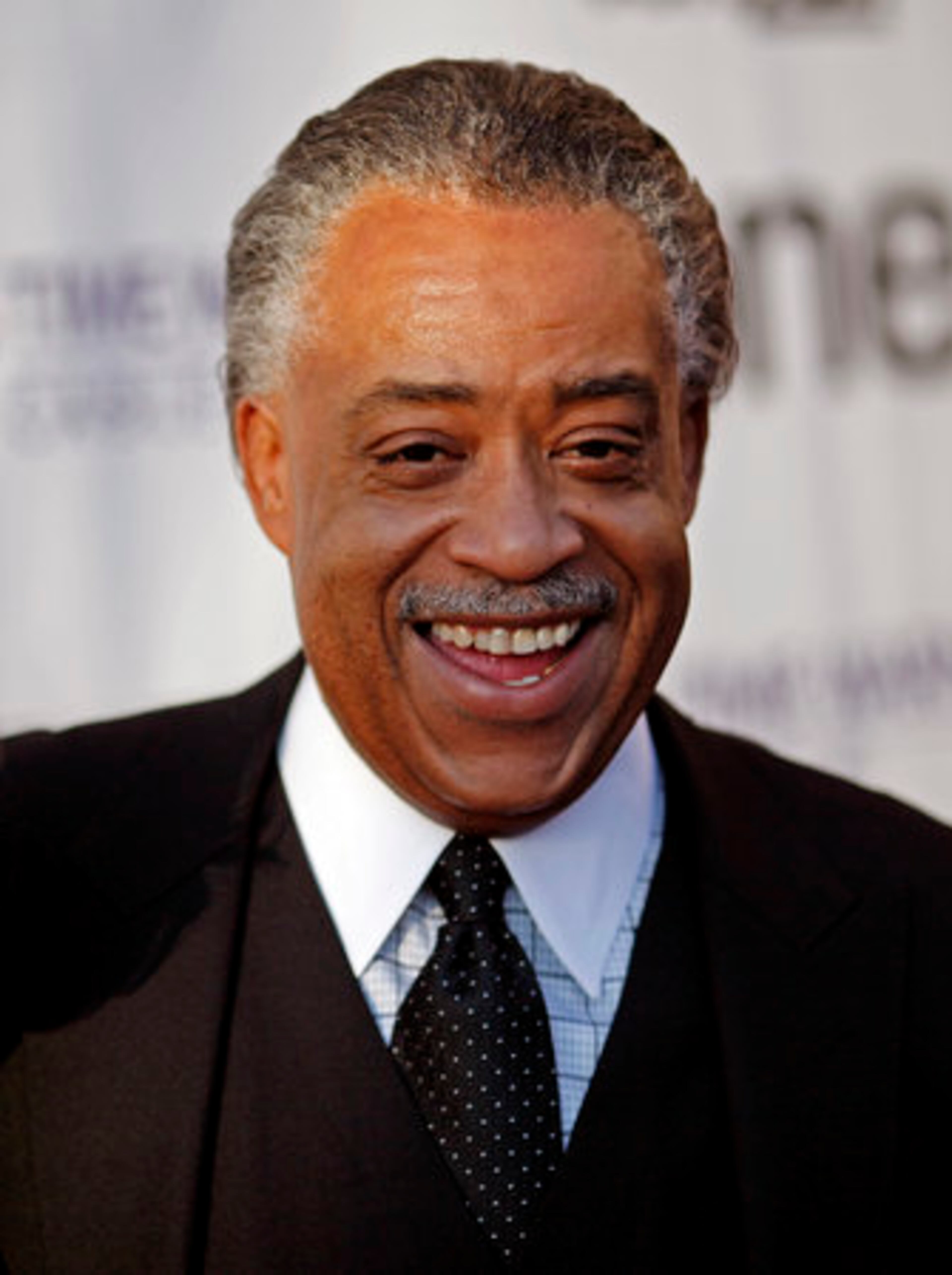 The Rev. Al Sharpton, once an aspiring performer himself, arrives for the Apollo Theater's annual Hall of Fame induction ceremony Monday in New York.
