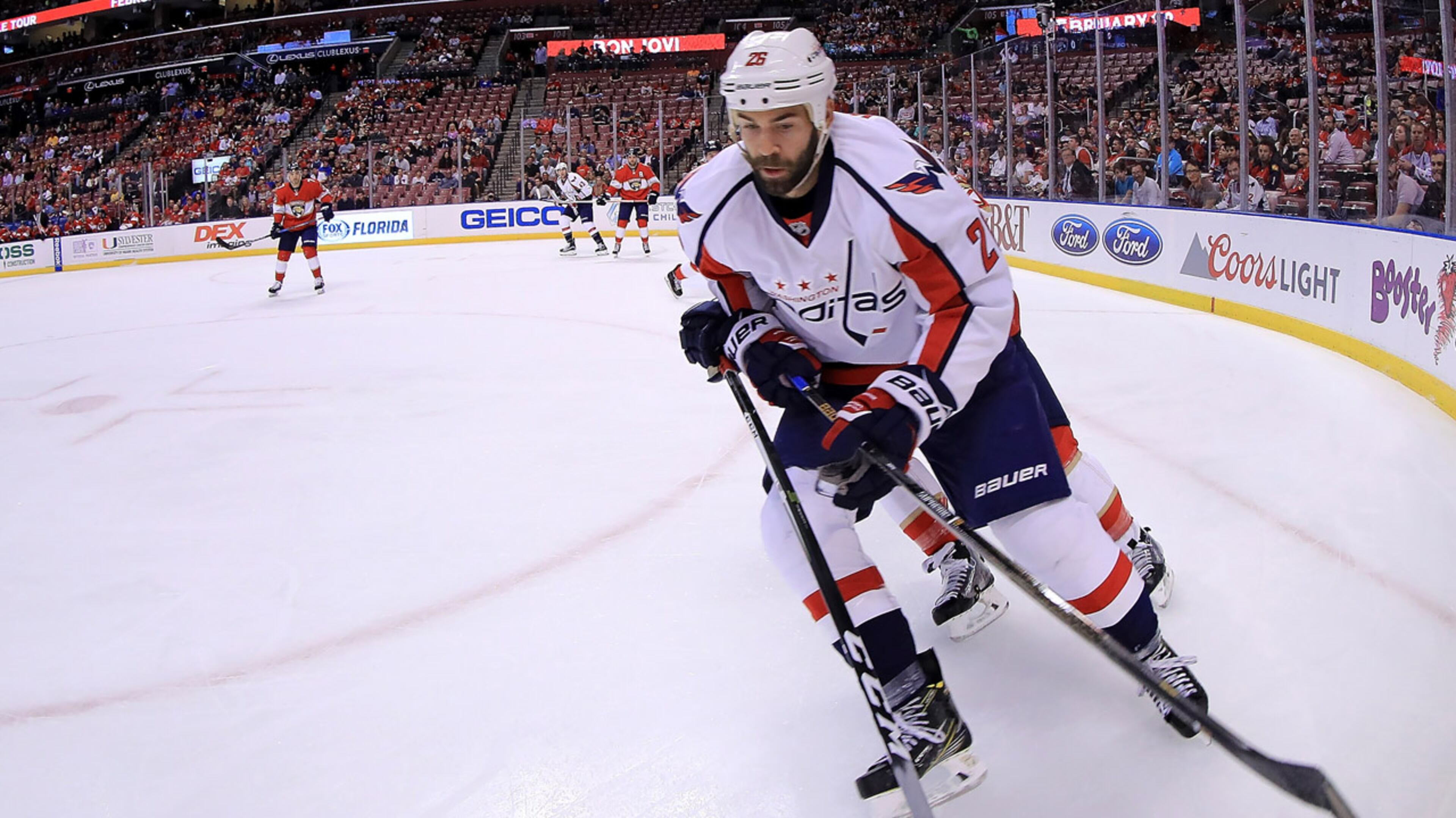 Daniel Winnik #26 of the Washington Capitals carries the puck during a game against the Florida Panthers at BB&T Center on October 20, 2016 in Sunrise, Florida.
