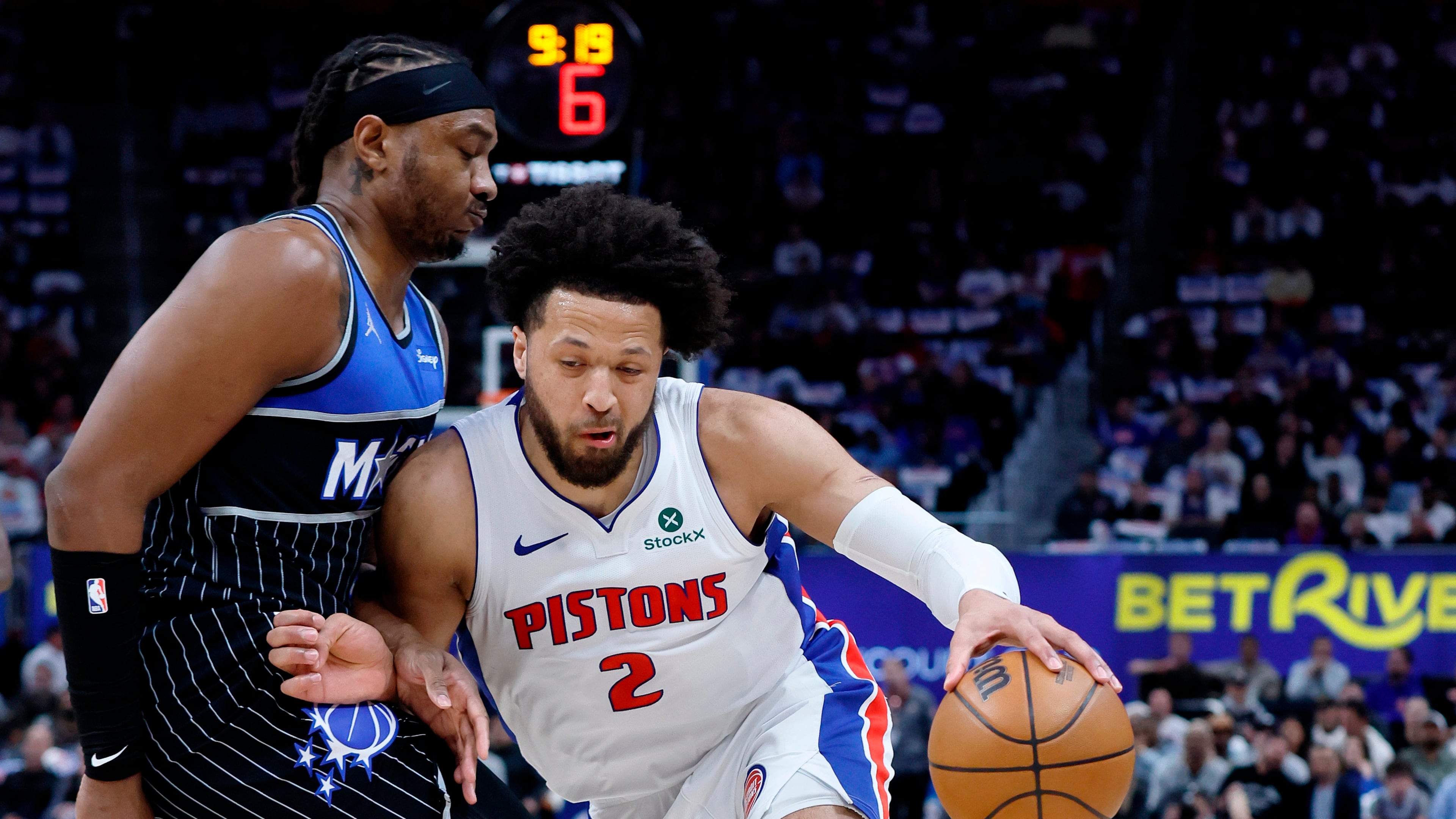 Detroit Pistons guard Cade Cunningham (2) drives against Orlando Magic center Wendell Carter Jr. (34) during the first half in Game 5 of a first-round NBA basketball playoffs series Wednesday, April 29, 2026, in Detroit. (AP Photo/Duane Burleson)