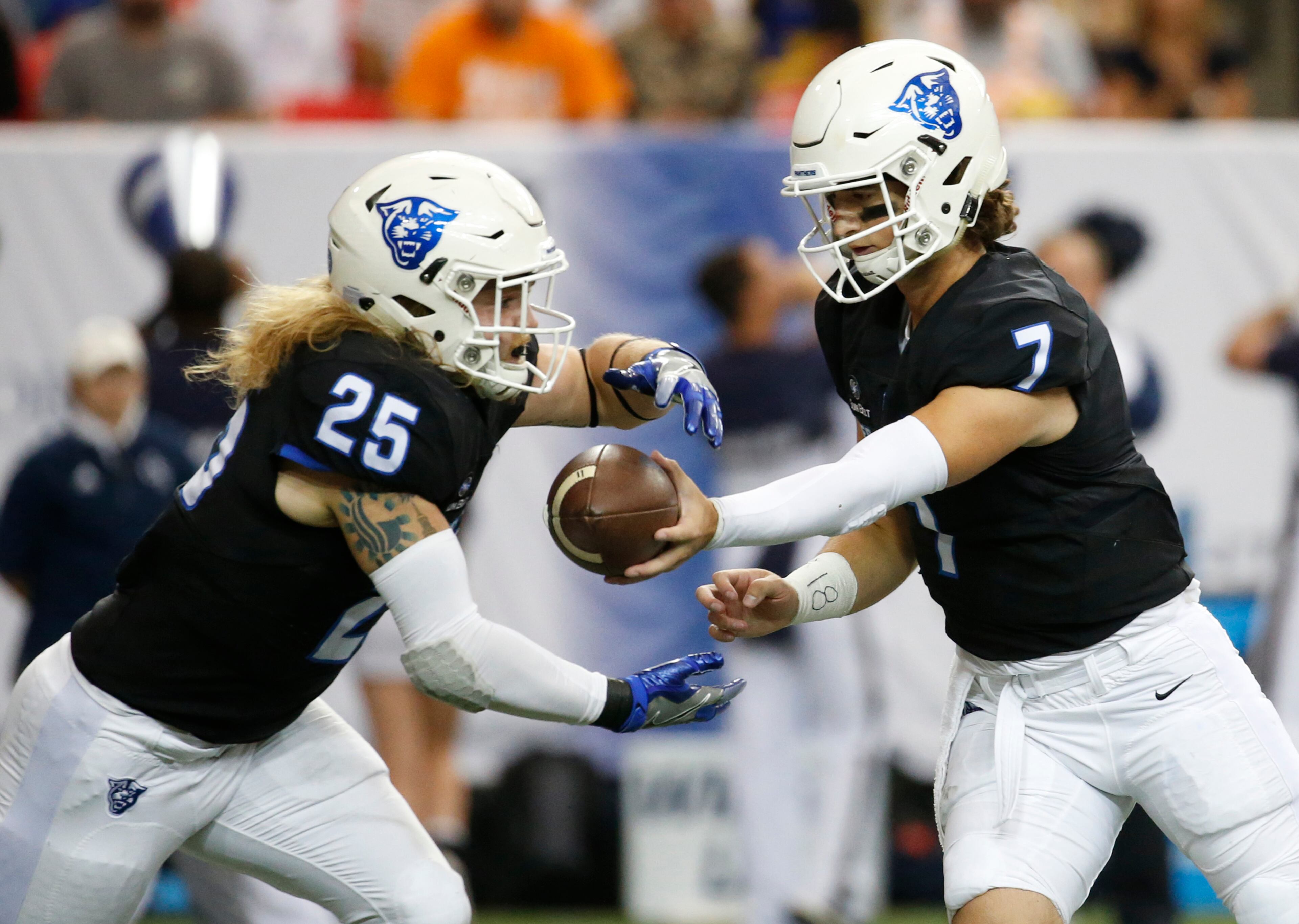 November 19, 2016 - Atlanta, Ga: Georgia State Panthers quarterback Conner Manning (7) hands off to running back Kyler Neal (25) against the Georgia Southern Eagles during the first half at the Georgia Dome Saturday November 19, 2016, in Atlanta, Ga. PHOTO / JASON GETZ