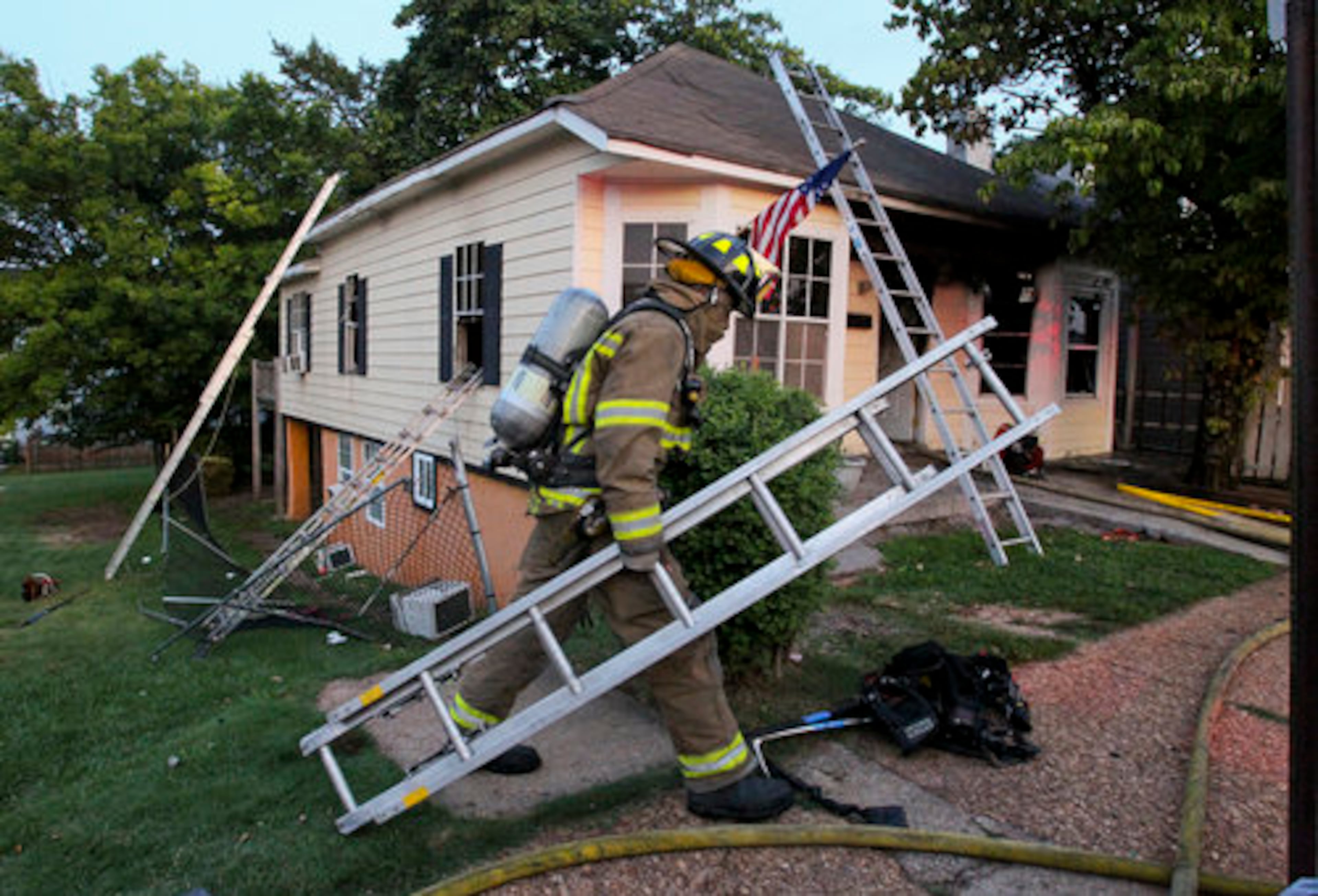 : Ladders were used for the rescue and primary and secondary searches throughout the rooming house. Capt. James Dycus said that as he did an initial walk around the house, he heard cries for help coming from a window.