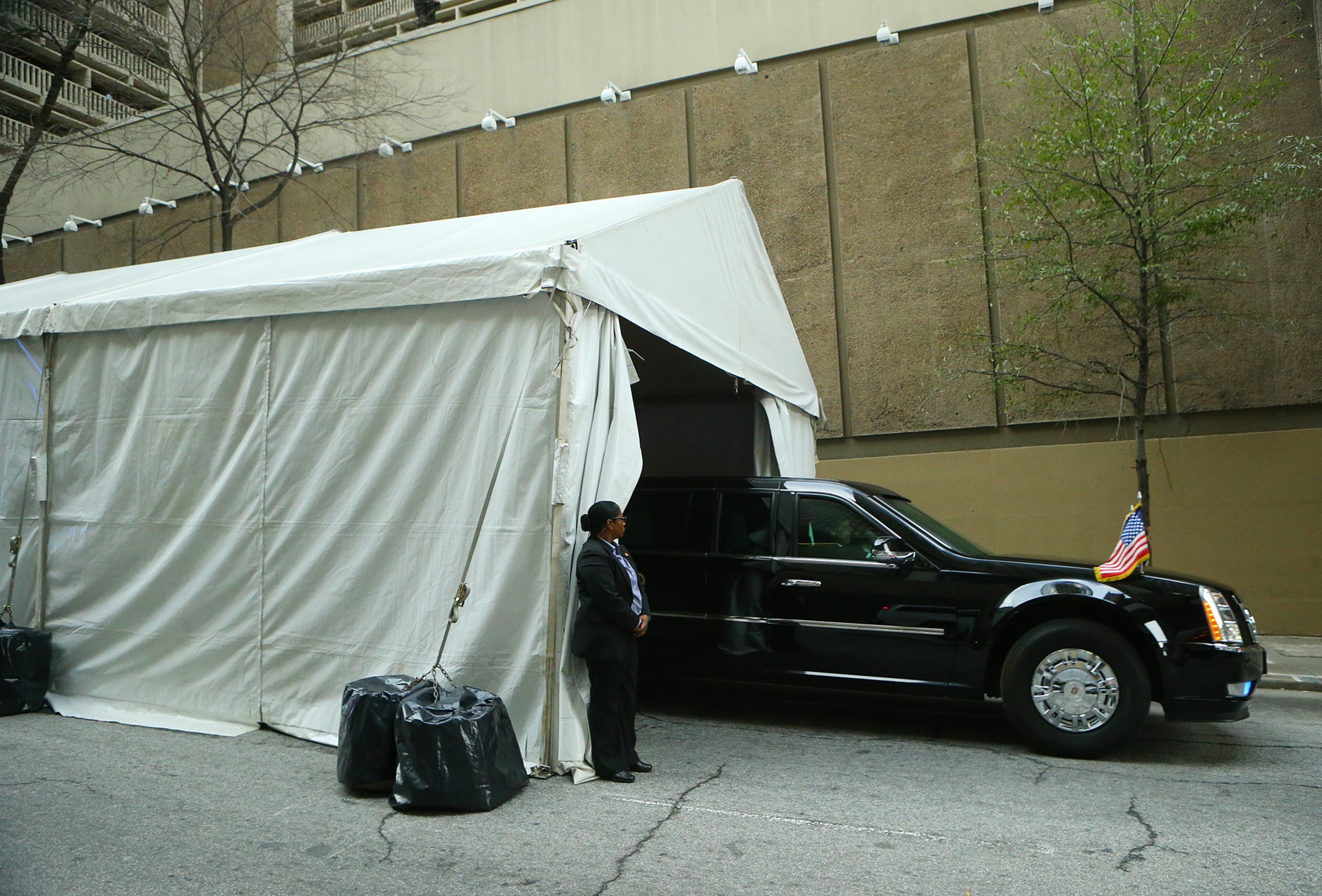 The presidential limo "The Beast" pulls out of a covered tent used to conceal President Barack Obama while he boards the vehicle leaving the Hyatt Regency for the airport on Tuesday, March 10, 2015, in Atlanta. Curtis Compton / ccompton@ajc.com
