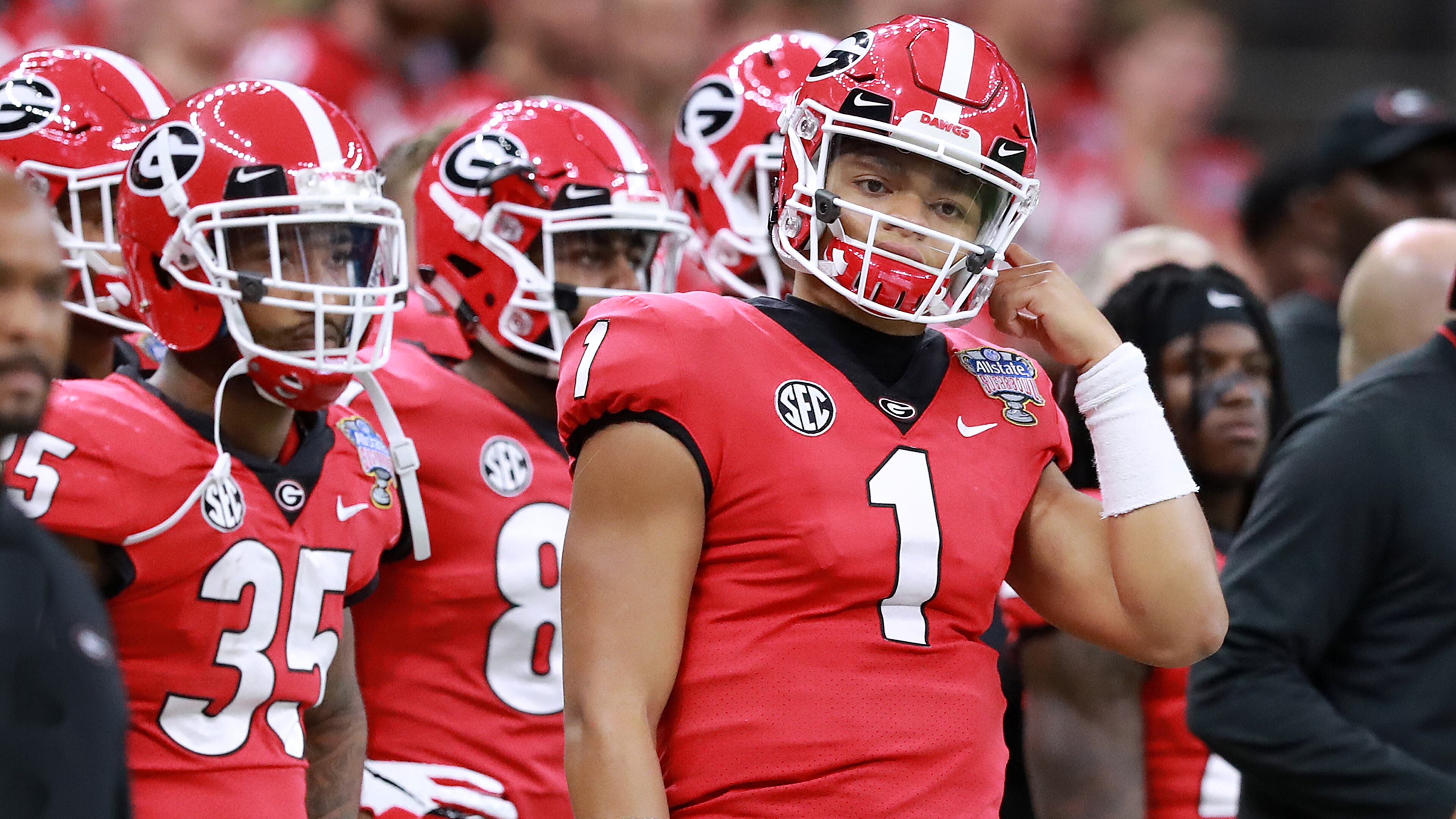 Georgia quarterback Justin Fields watches from the sidelines during the first half of the Sugar Bowl Tuesday, Jan. 1, 2019, at Mercedes-Benz Superdome in New Orleans.