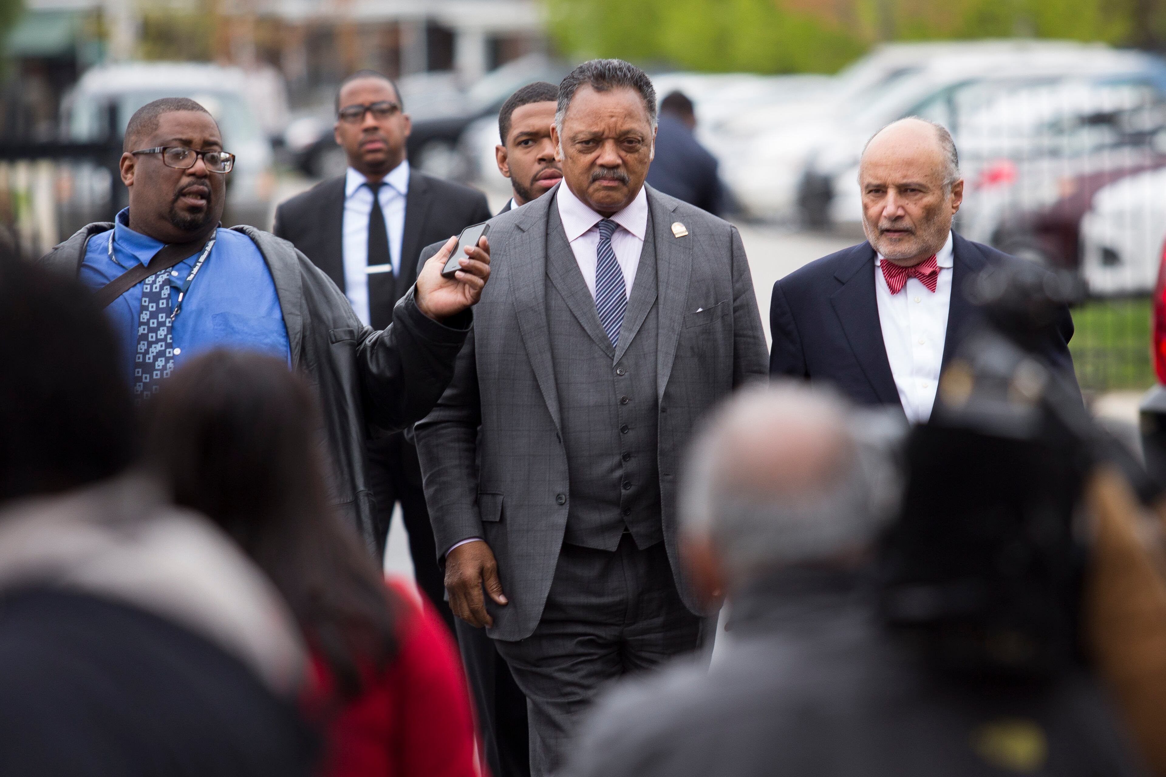 BALTIMORE, MD - APRIL 27: Rev. Jesse Jackson (2nd R) speaks to the media upon arriving at New Shiloh Baptist Church for the funeral service for Freddie Gray, April 27, 2015 in Baltimore, Maryland. Gray, 25, was arrested for possessing a switch blade knife April 12 outside the Gilmor Homes housing project on Baltimore's west side. According to his attorney, Gray died a week later in the hospital from a severe spinal cord injury he received while in police custody. (Drew Angerer/Getty Images)
