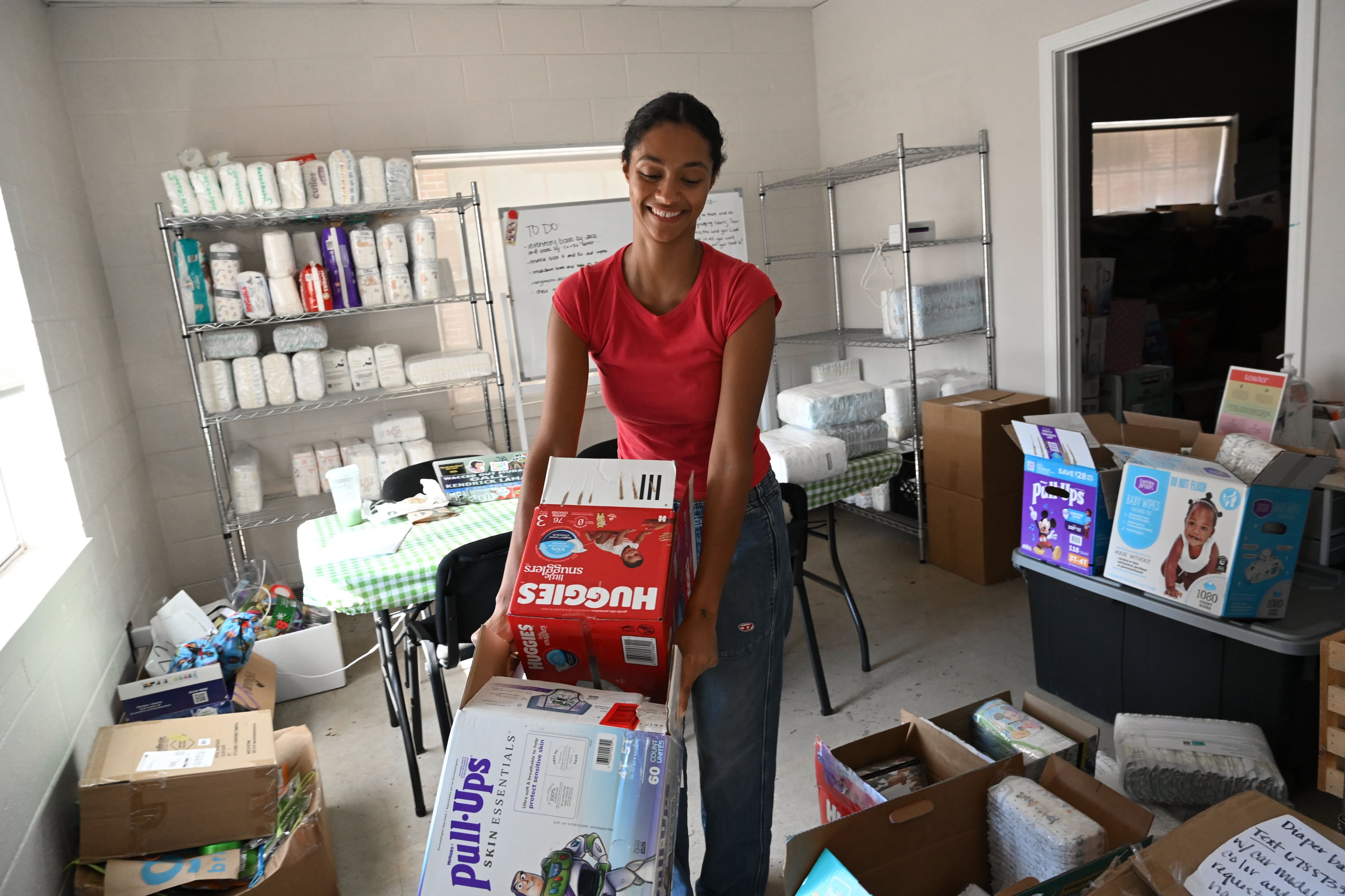 Jaycina Almond, who founded the Tender Foundation in 2020, created the idea of helping Atlanta mothers make ends meet based on her experiences as a 20-year-old new mother. (Hyosub Shin/AJC)