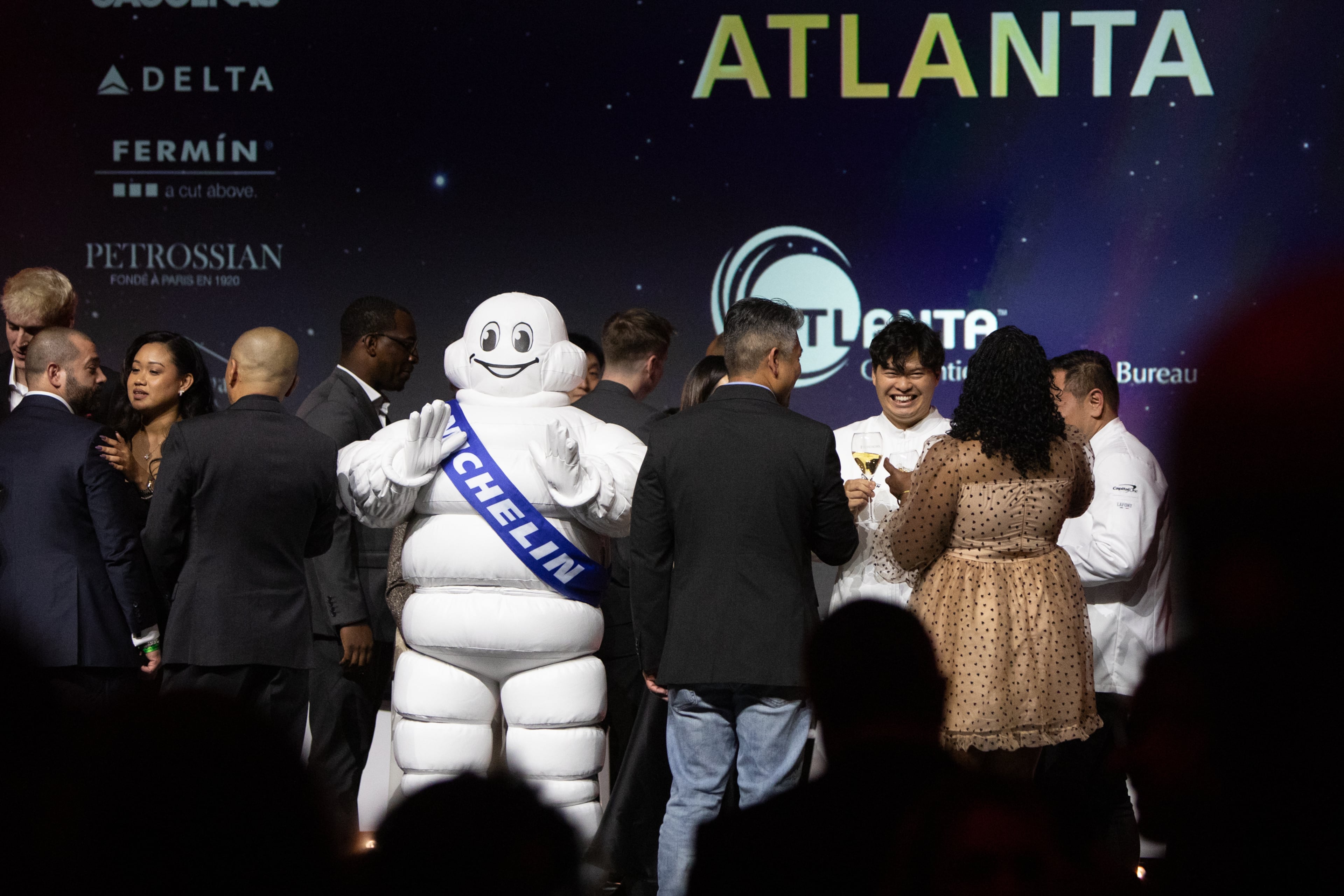 Michelin Star winners gather on stage at the ceremony for the Atlanta guide in 2024, the second year the guidebook rated restaurants in the metro area. The Michelin Guide 2026 American South ceremony will be held in Nashville in October. (Jenni Girtman for The Atlanta Journal-Constitution)