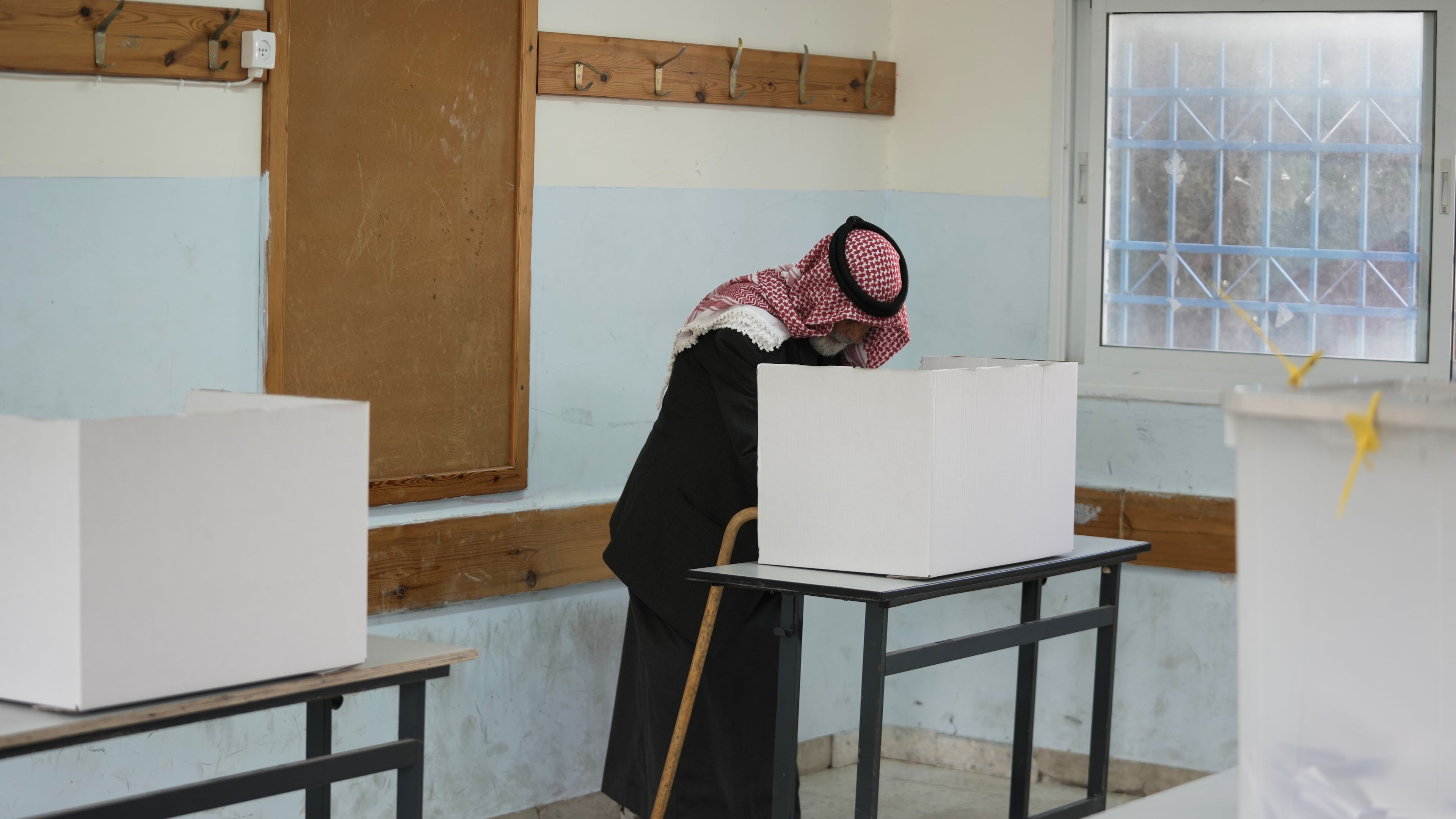 A Palestinian man votes in local elections, the first in two decades in Gaza and the first in the occupied West Bank since the start of the Israel-Hamas war in Al-Ubaidiya, West Bank, Saturday, April 25, 2026. (AP Photo/Mahmoud Illean)