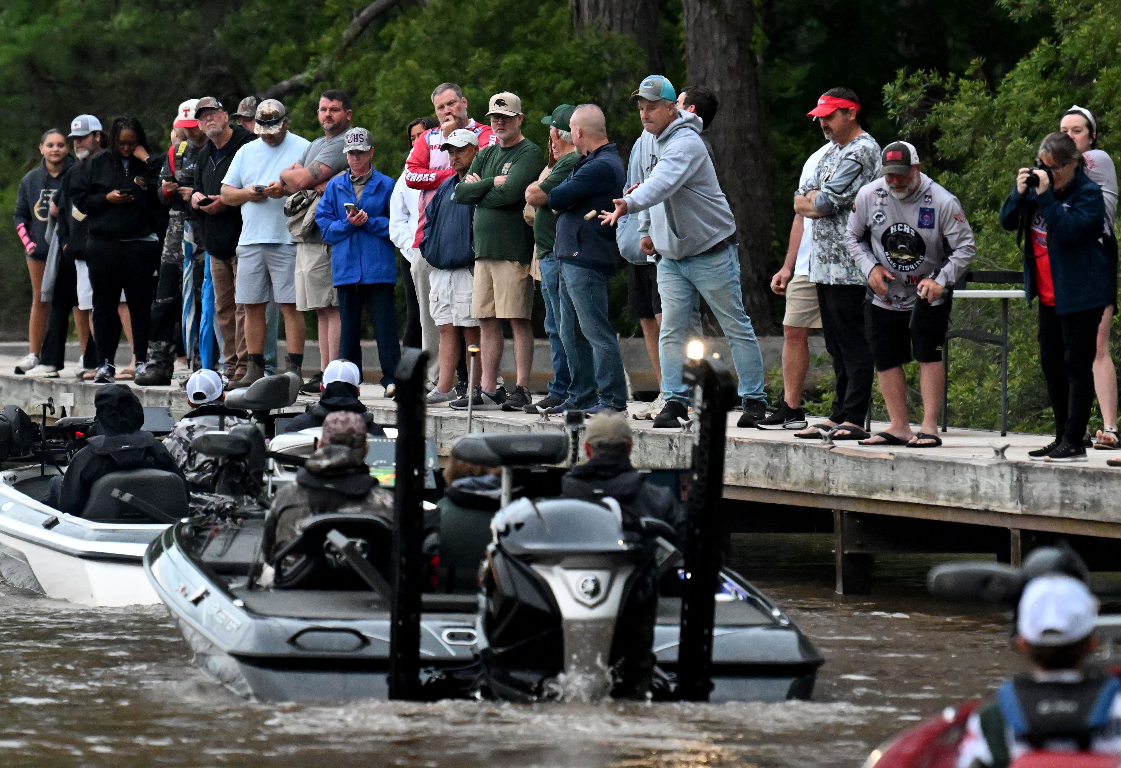 Student anglers and their coaches head out early in the morning on Lake Sinclair. The 2026 GHSA Bass Fishing State Championship features a smaller field of 113 boats and presents a tougher challenge because of the lake’s size, shallow depth and difficult early May fishing conditions. (Hyosub Shin/AJC)