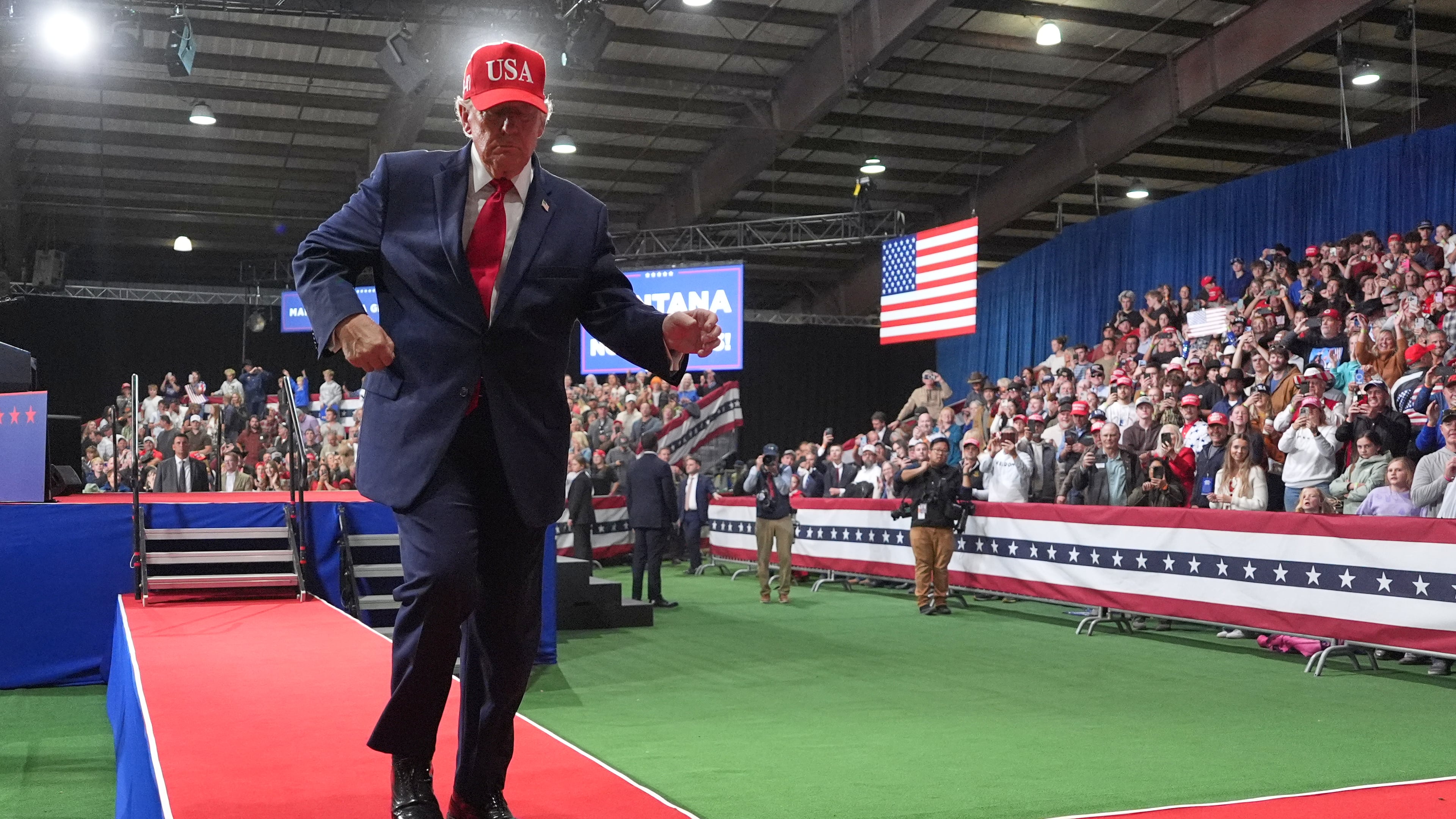 President Donald Trump dances at a campaign rally at Majestic Valley Arena, Wednesday, Oct. 14, 2026, in Kalispell, Mont. (AP Photo/Alex Brandon)