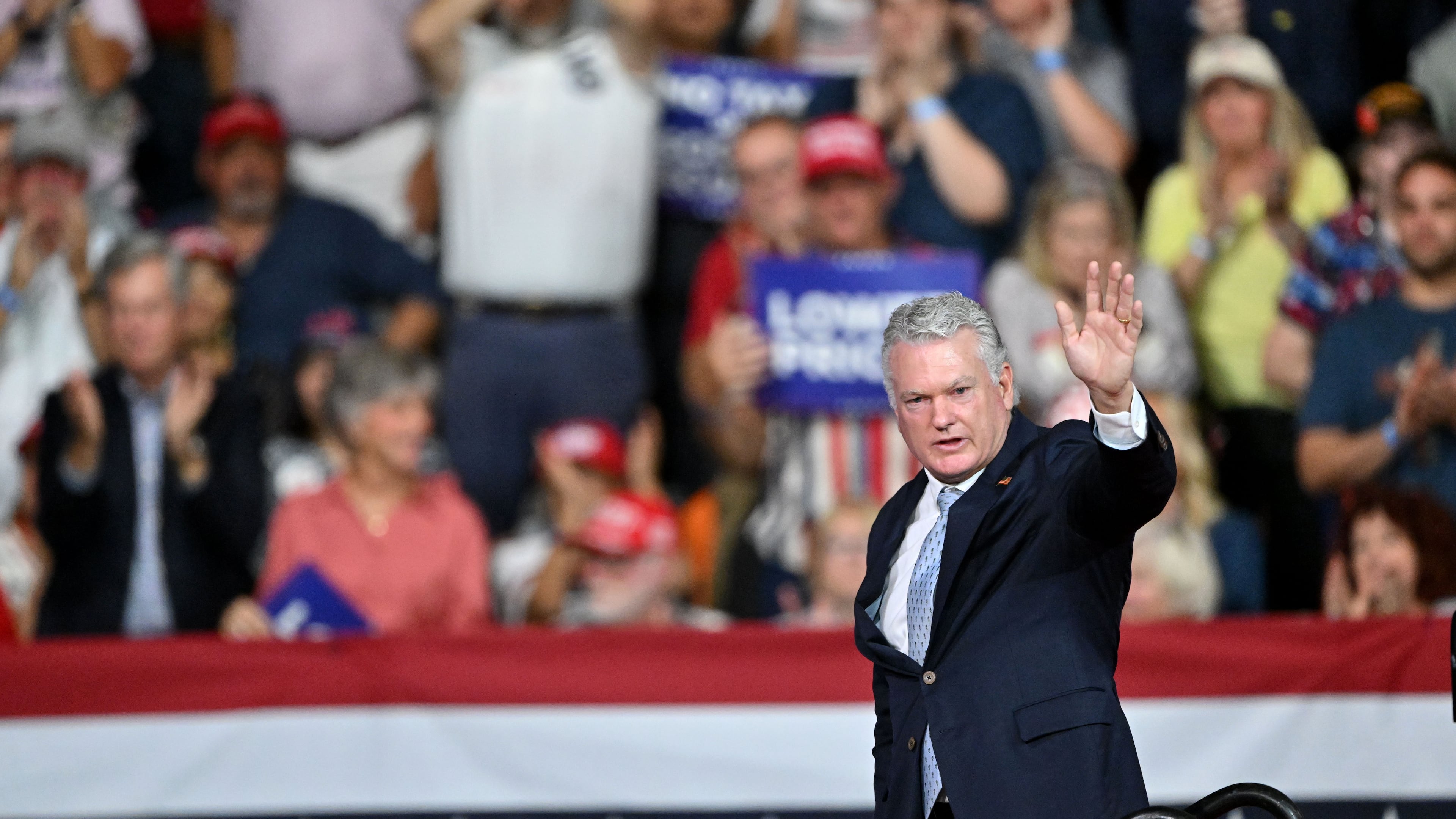Georgia U.S. Senate candidate Rep. Mike Collins waves as he leaves the stage before President Donald Trump arrives at a midterm campaign rally at Guardian Centers on Saturday, Oct. 24, 2026, in Perry. (Hyosub Shin/AJC)