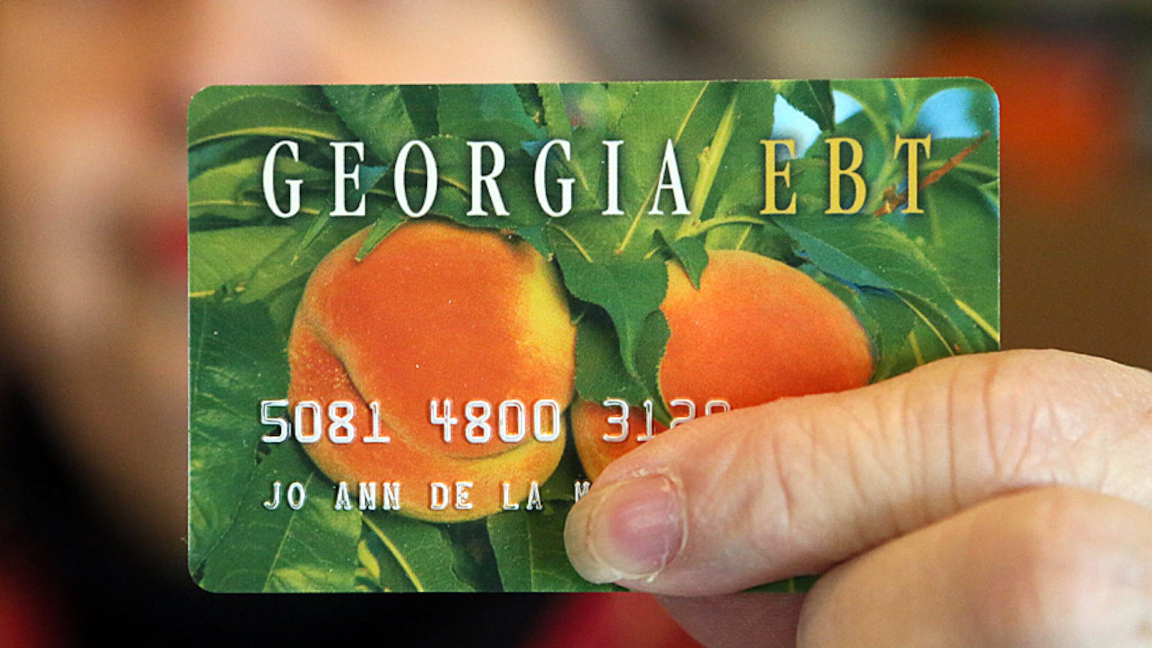A Georgia EBT card, which can be used at participating grocery stores and farmers markets for food purchases.