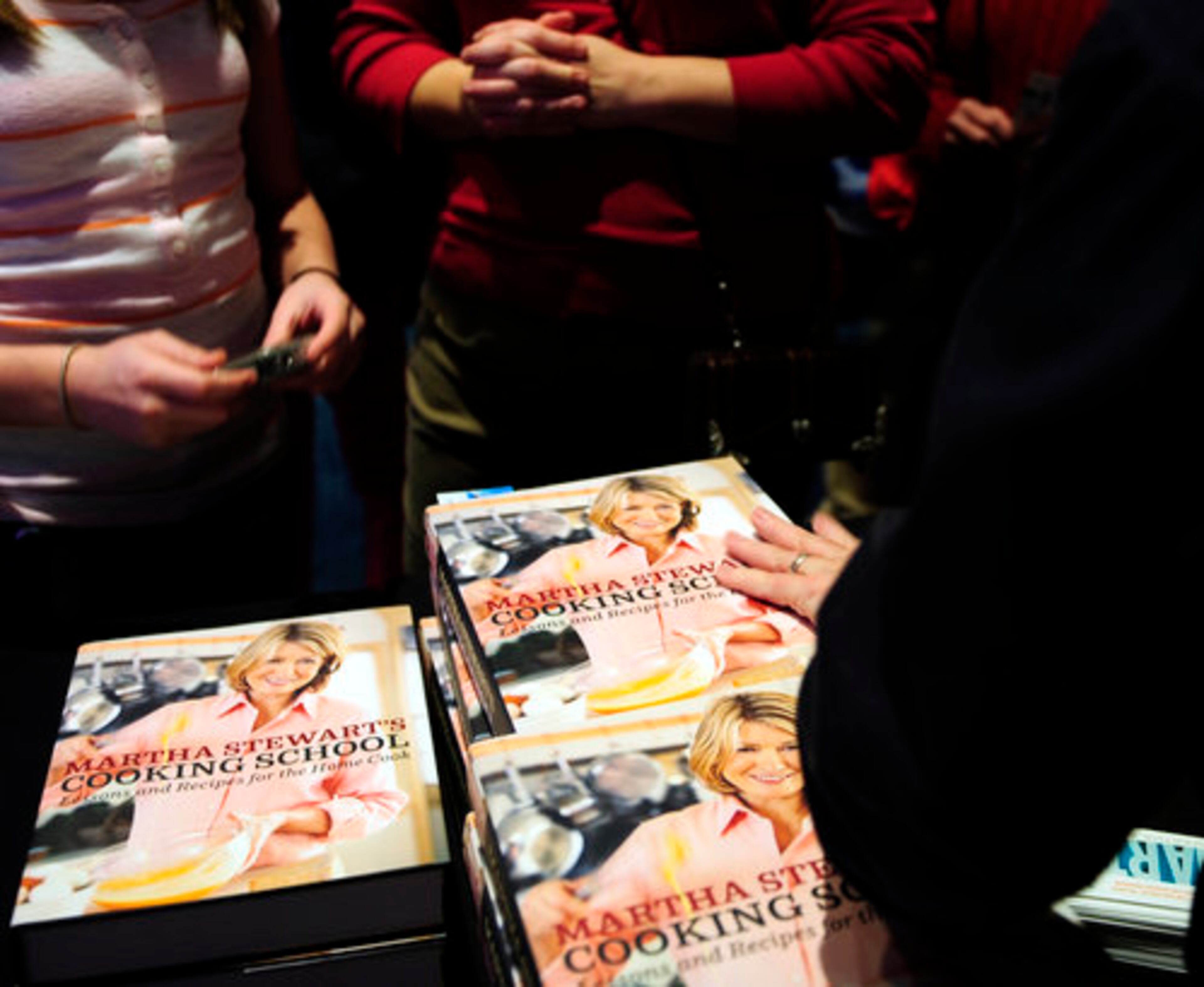 "Martha Stewart's Cooking School" was one of the volumes she signed for fans.