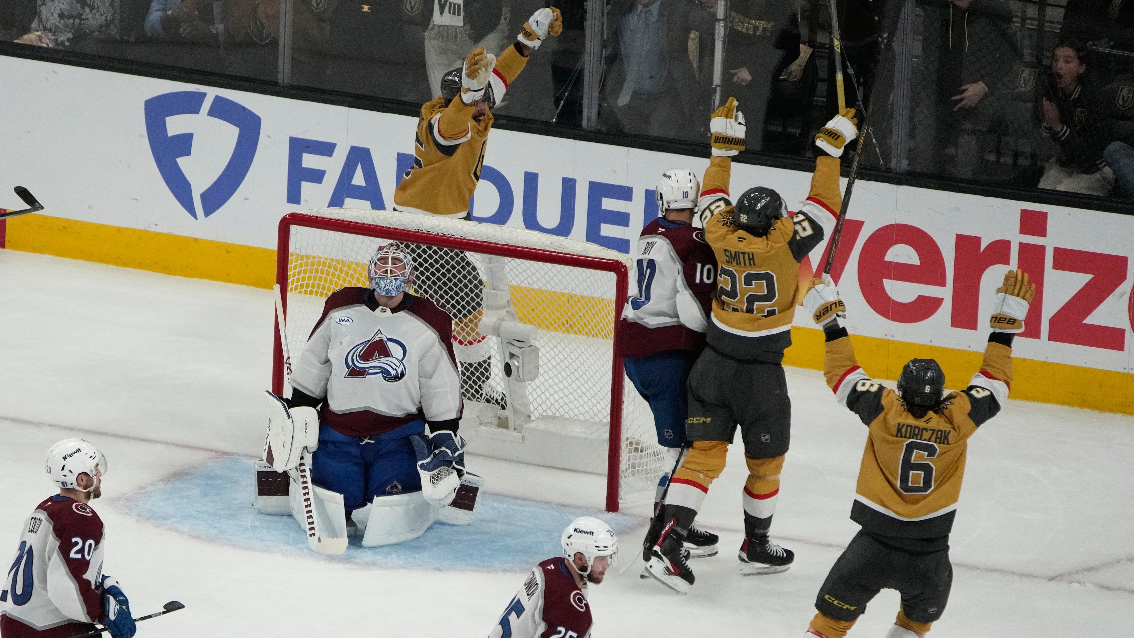 Vegas Golden Knights right wing Cole Smith (22) celebrates after scoring against the Colorado Avalanche during the third period in Game 4 of the Western Conference finals NHL hockey Stanley Cup playoff series Tuesday, May 26, 2026, in Las Vegas. (AP Photo/John Locher)
