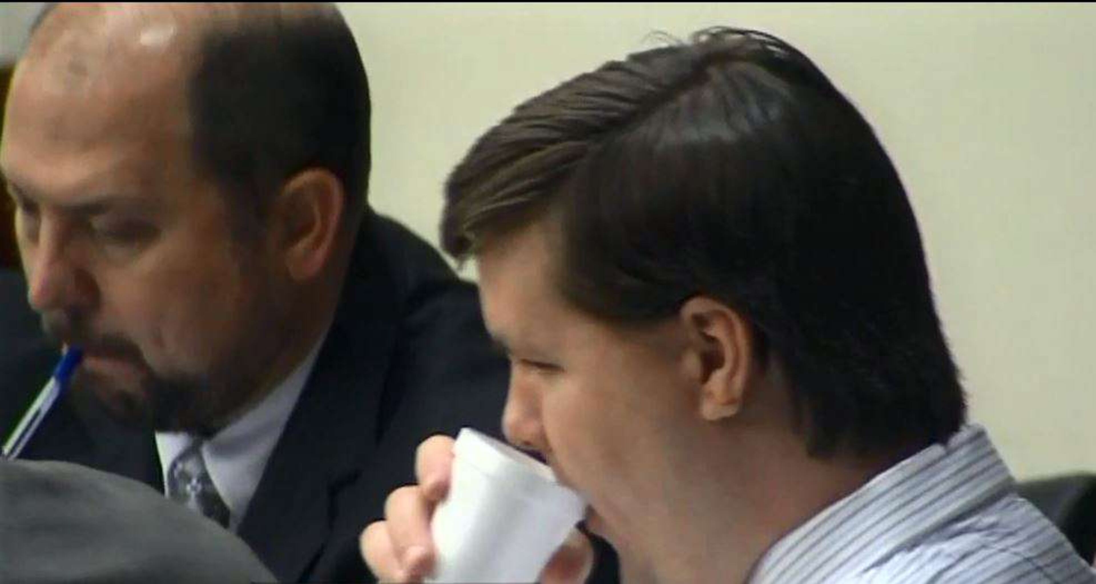 Ross Harris sits at the defense table with attorney Bryan Lumpkin, left, during jury selection. This image is a screen capture from WSB-TV.