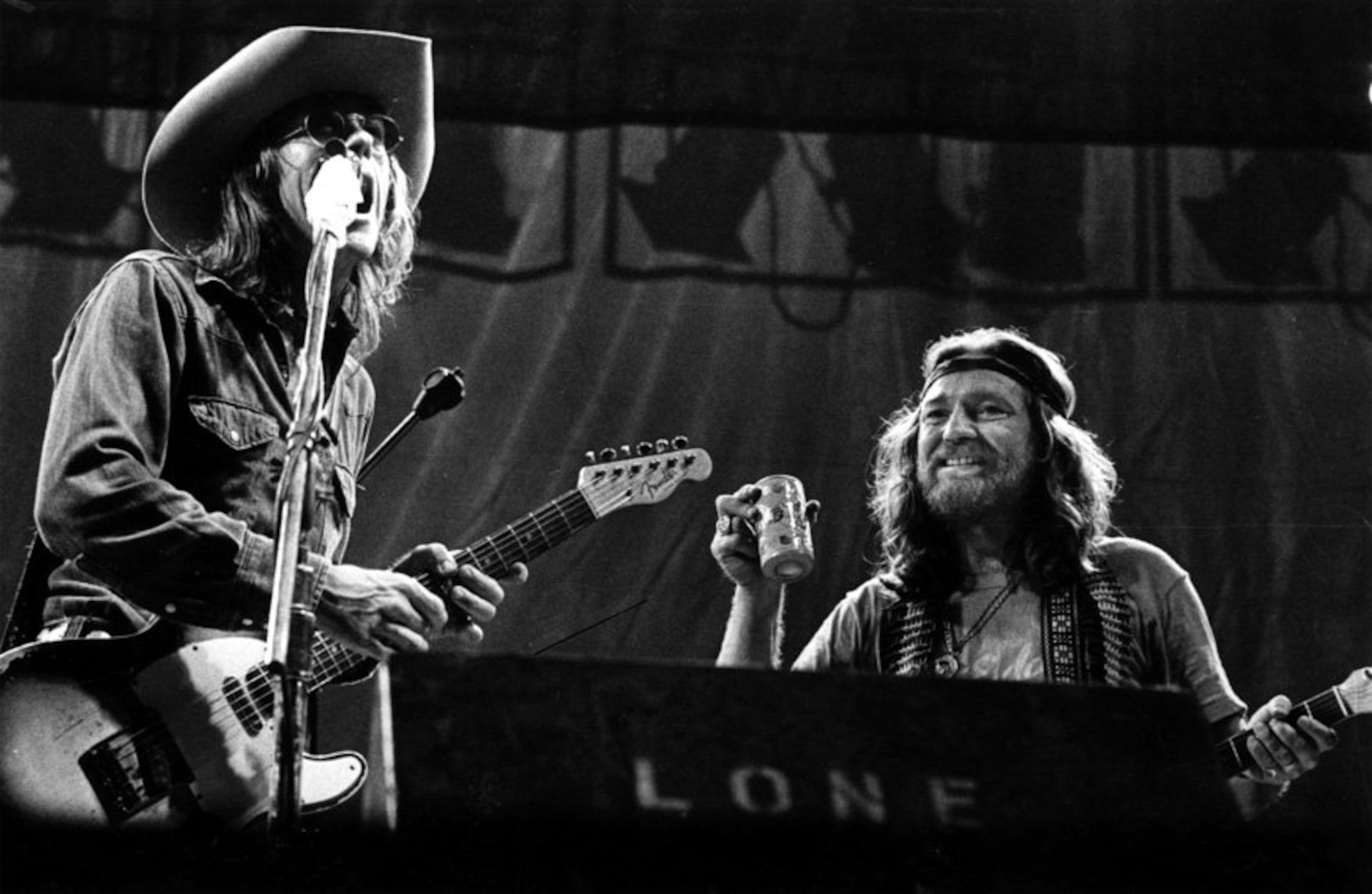 Willie Nelson and Doug Sahm at the 1976 Fourth of July Picnic. Archive photograph reproduced by The Atlanta Journal-Constitution.