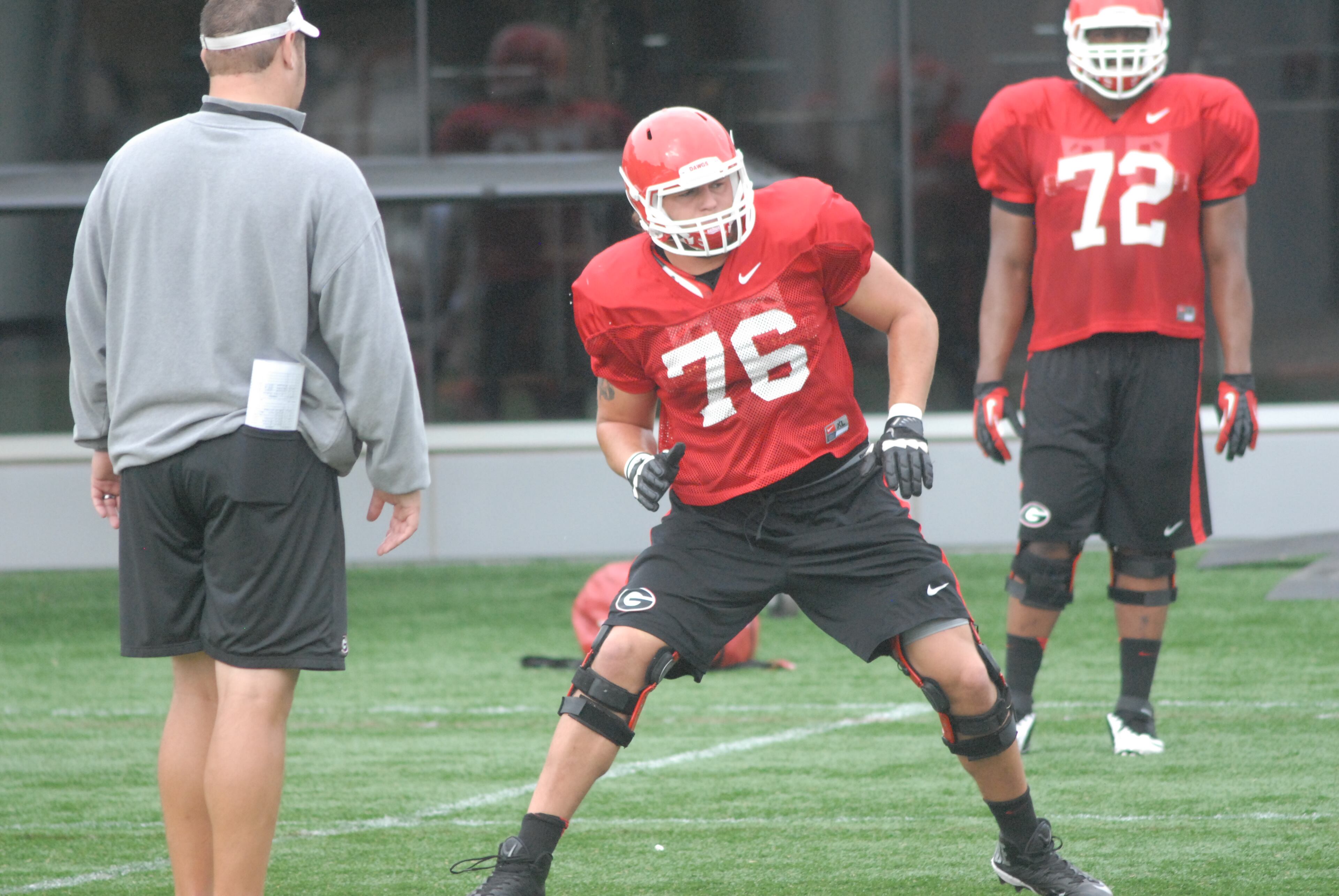 Tackle Zach DeBell (76) goes through a drill during Georgia's practice Thursday, Aug. 8, 2013, in Athens, Ga. (Photo by Steven Colquitt)
