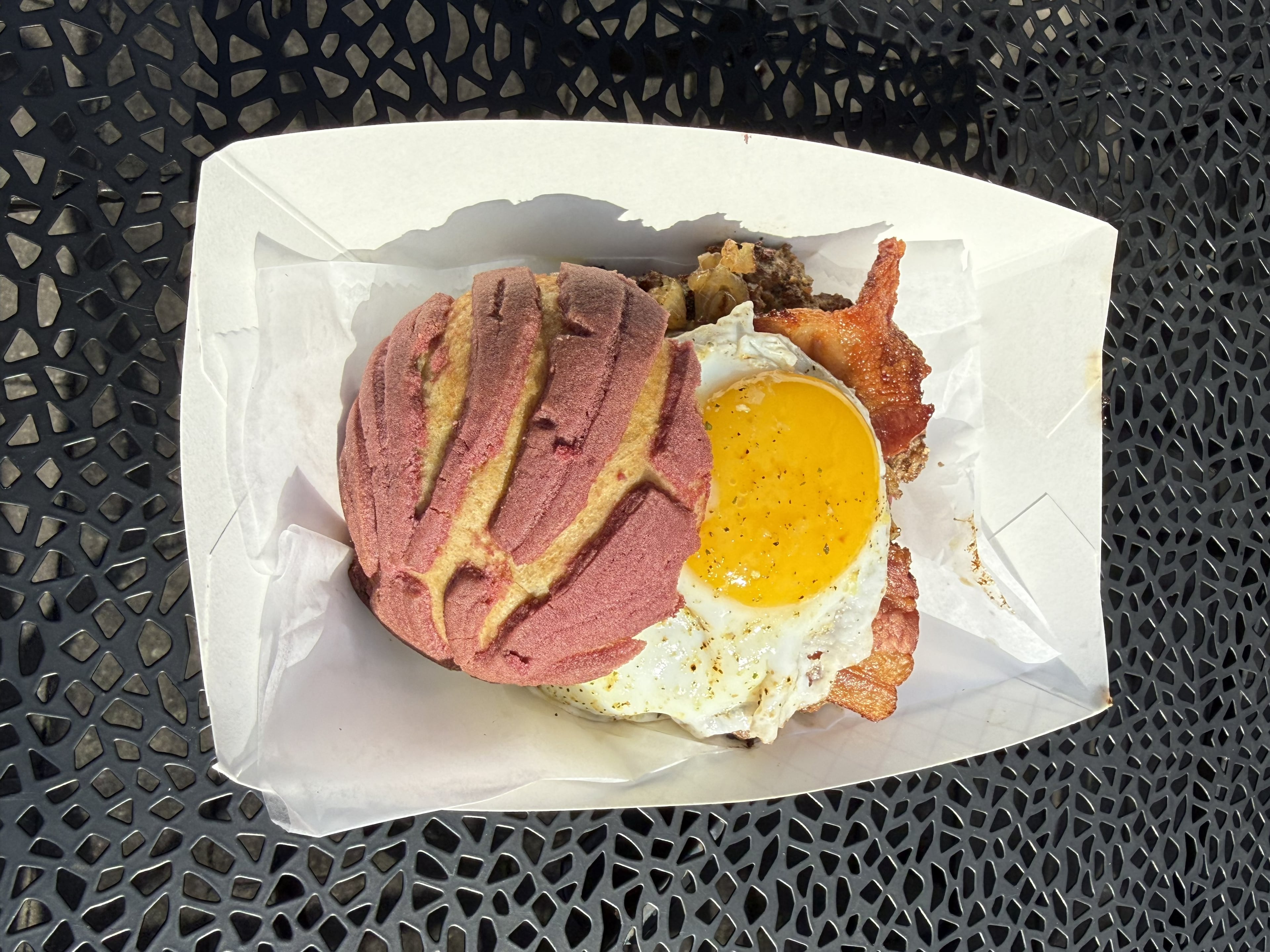 Buen Provecho’s concha burger. (Courtesy of Sam Flemming)