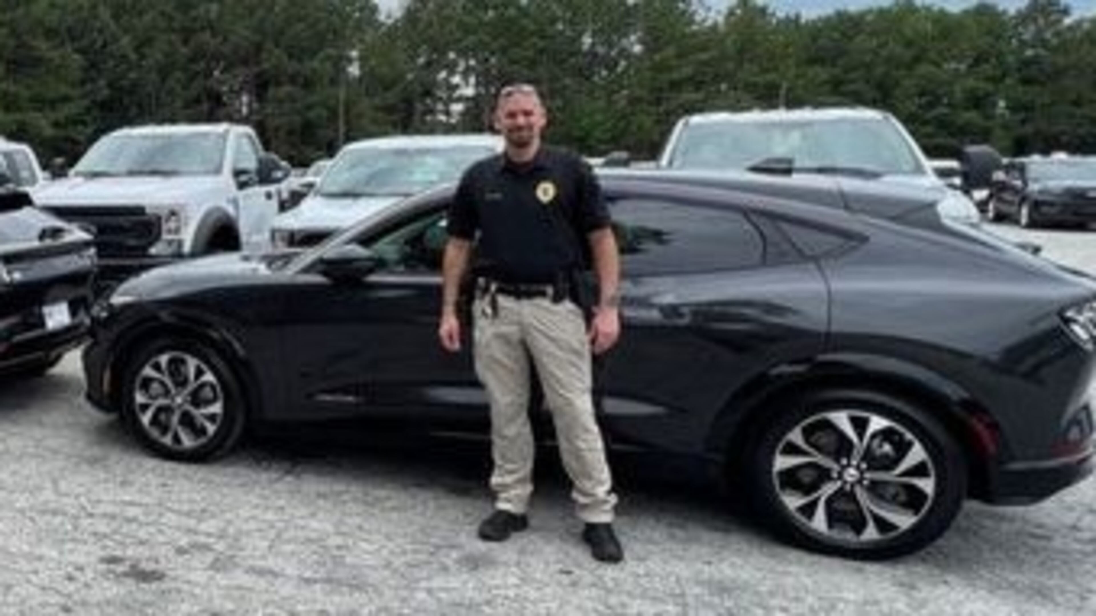 Officers from the Avondale Estates Police Department are shown with the city's three new electric vehicles for its administrative fleet. (Courtesy of Jarid T. Ison of Ward Ford)