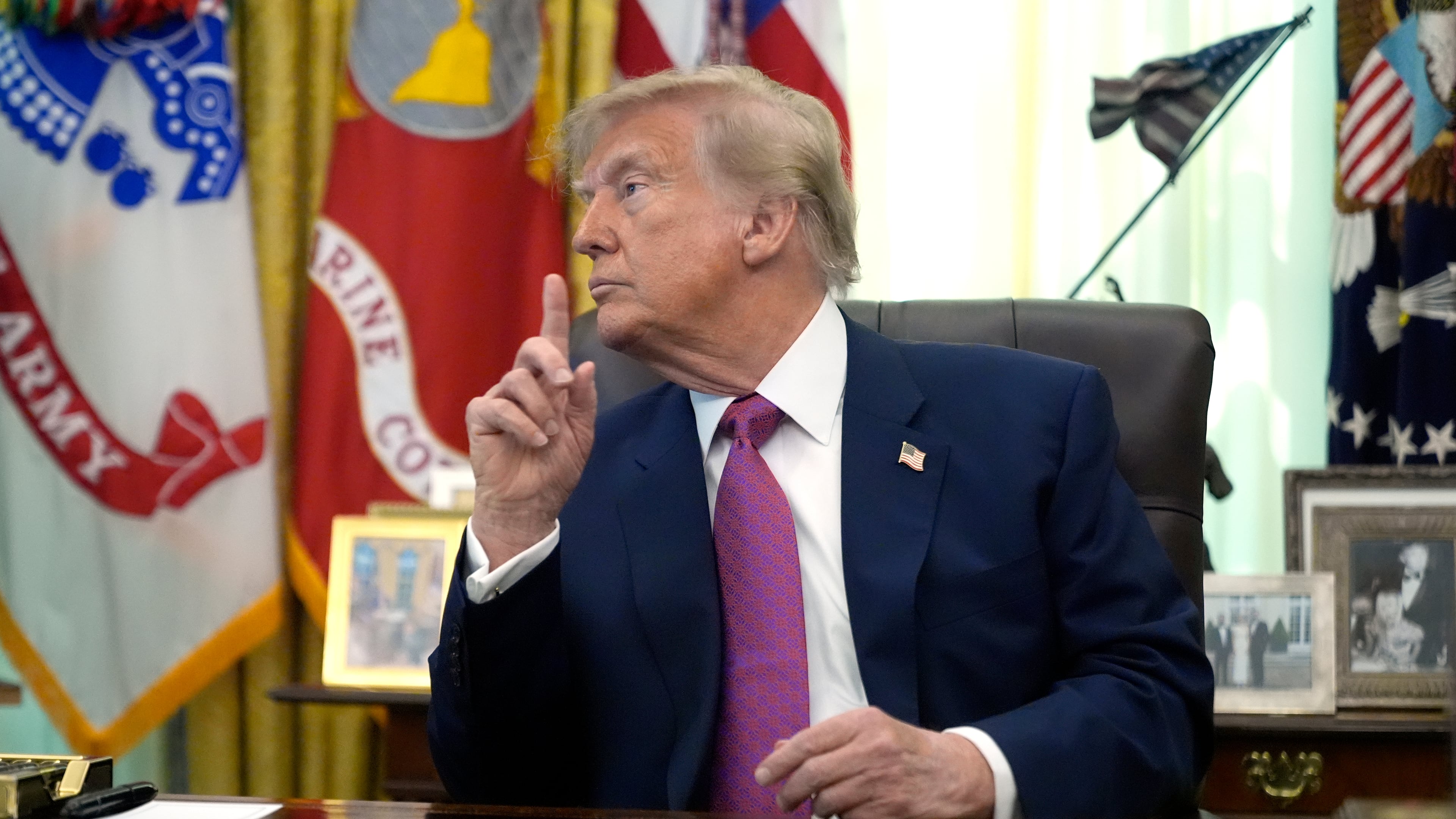 President Donald Trump gestures in the Oval Office of the White House, Thursday, Aug. 27, 2026, in Washington. (AP Photo/Manuel Balce Ceneta)