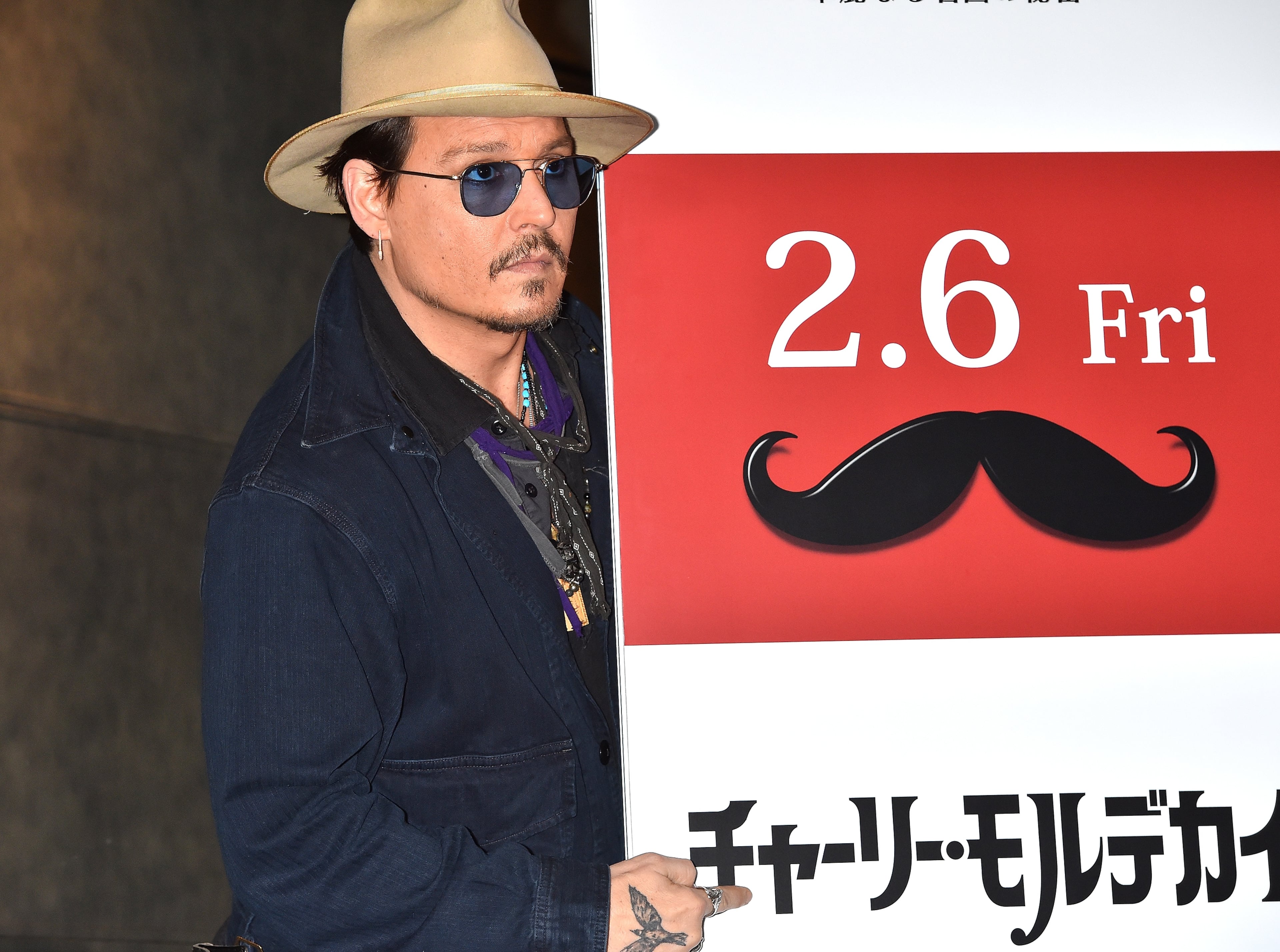 TOKYO, JAPAN - JANUARY 28: Johnny Depp attends the photo call for "Mortdecai" at The Peninsula Tokyo on January 28, 2015 in Tokyo, Japan. (Photo by Koki Nagahama/Getty Images)
