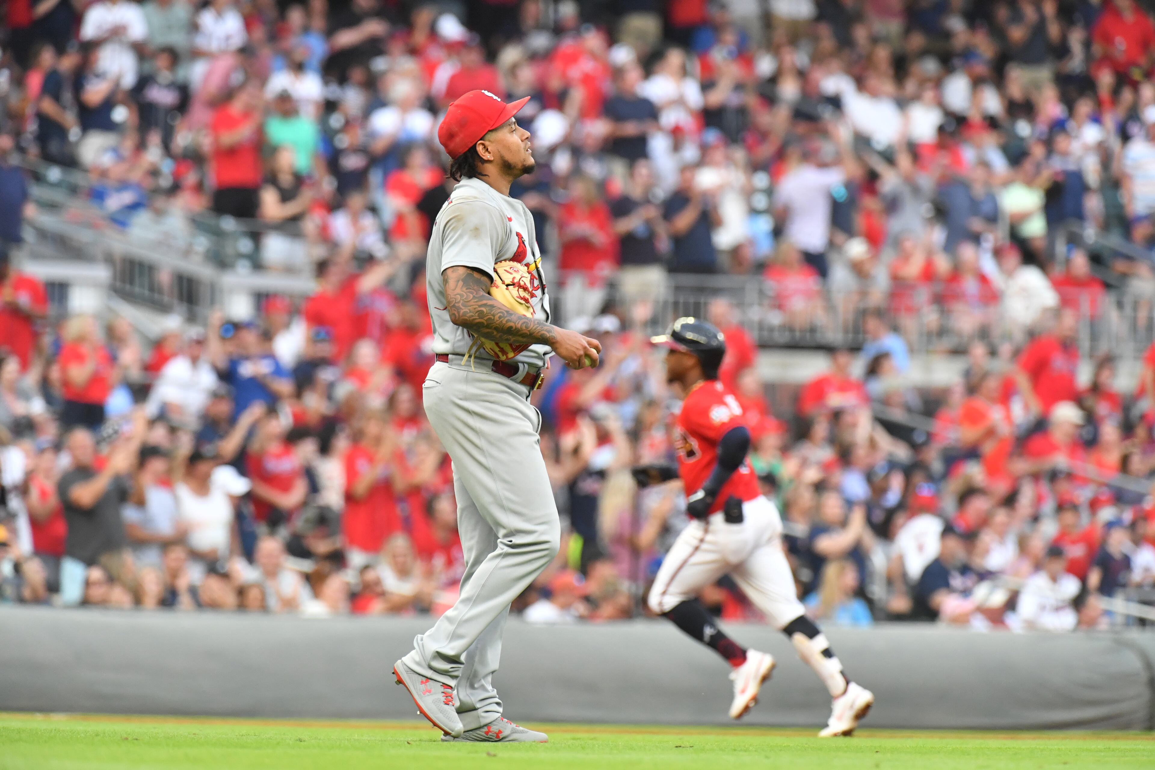 St. Louis Cardinals starting pitcher Carlos Martinez (18) reacts after allowing a solo homer by Atlanta Braves second baseman Ozzie Albies (1) in the second inning. (Hyosub Shin / Hyosub.Shin@ajc.com)