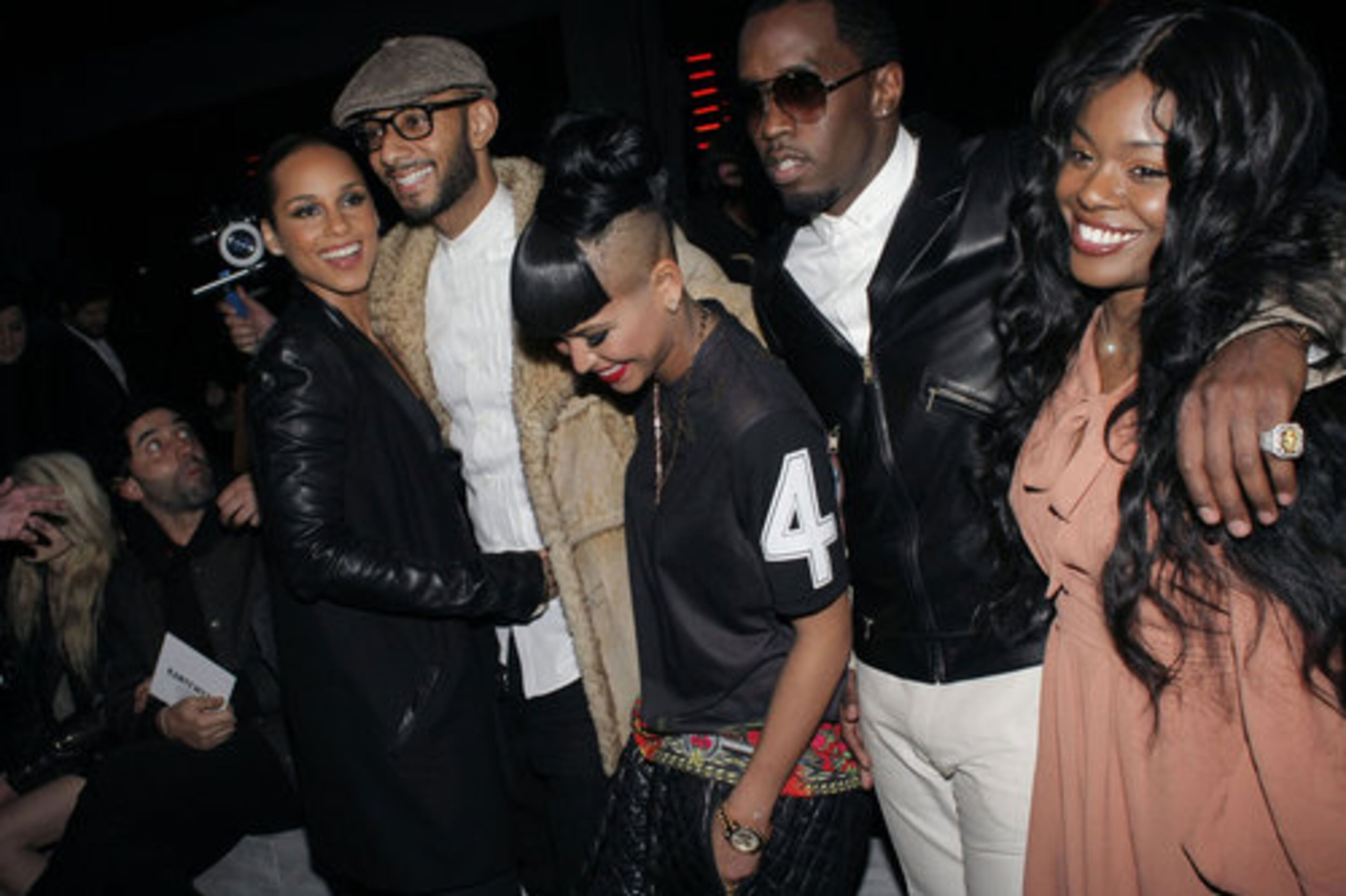 Alicia Keys, left, her husband Swizz Beatz, second from left, Cassie, center, and Sean "P. Diddy" Combs, and an unidentified woman, right, attend to Kanye West presentation for Women's Fall-Winter, ready-to-wear 2013 fashion collection.