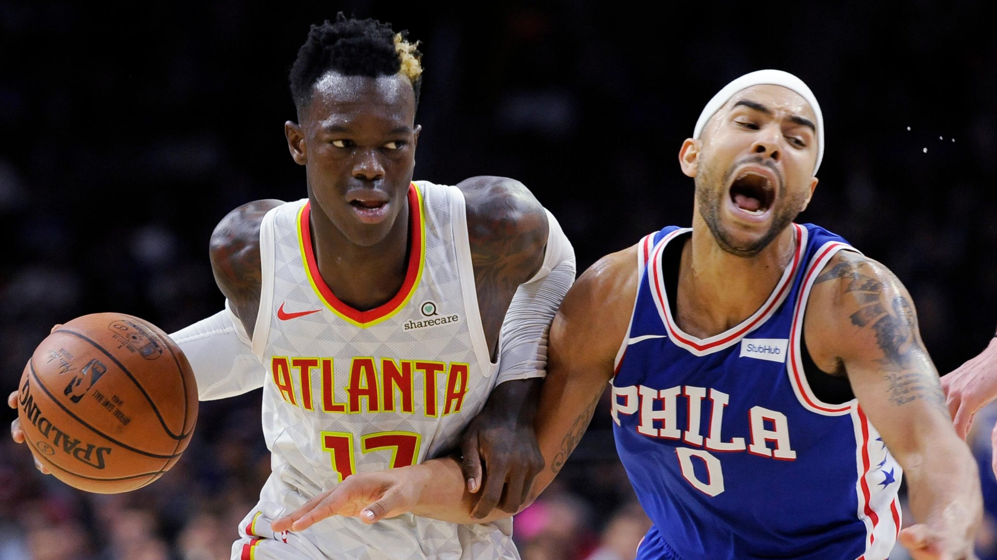 Atlanta Hawks' Dennis Schroder, left, fouls Philadelphia 76ers' Jerryd Bayless during the second half of an NBA basketball game, Wednesday, Nov. 1, 2017, in Philadelphia. The 76ers won 119-109. (AP Photo/Michael Perez)