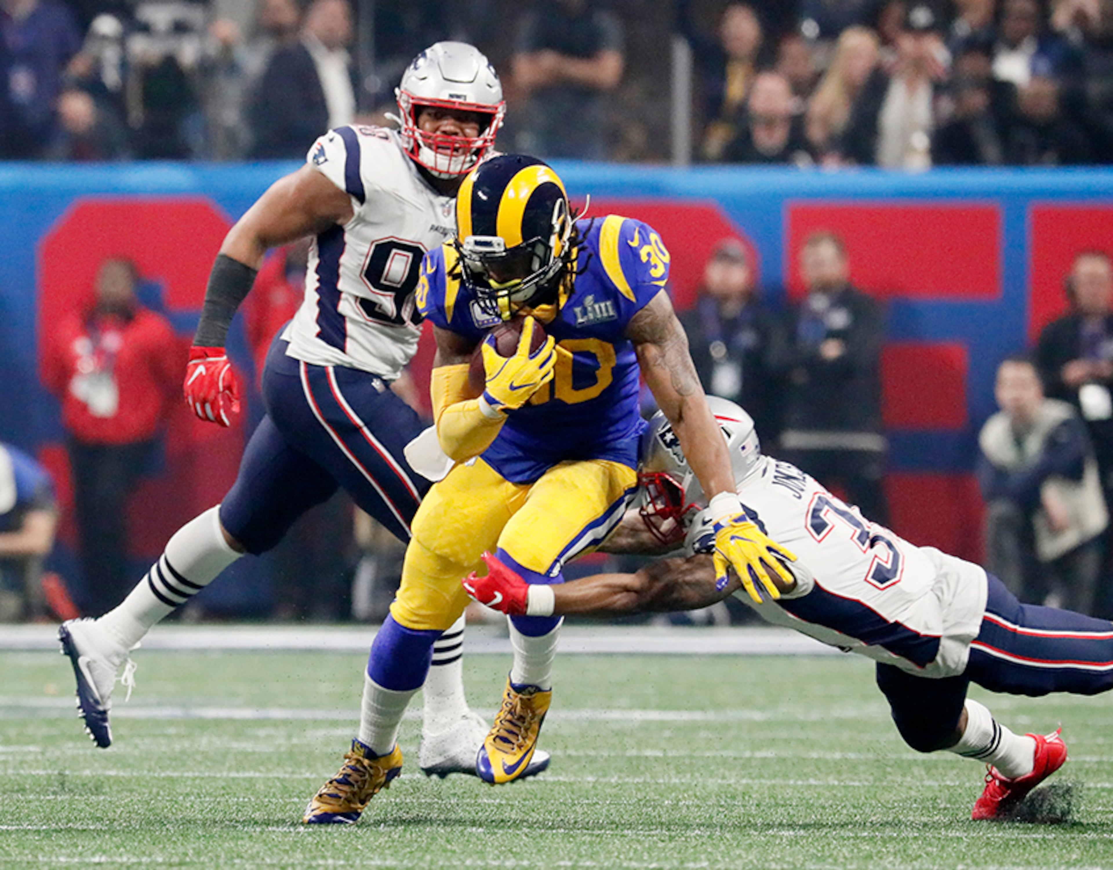 Los Angeles Rams running back Todd Gurley (30) carries the ball during the fourth quarter against the New England Patriots Sunday, Feb. 3, 2019, during Super Bowl LIII at Mercedes-Benz Stadium in Atlanta.
